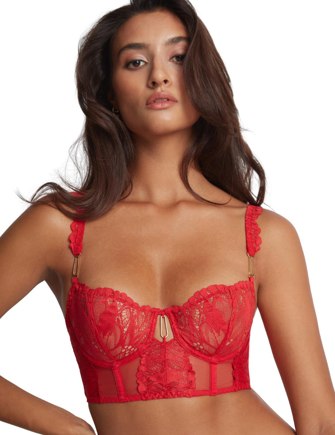 If you love a longline bra, this bustier from the Flowermania range by Aubade will be the perfect new sexy addition to upgrade your lingerie collection. It is covered in a combination of floral lace and transparent tulle with flirty lace edges and a luxurious gold charm in the centre. The cups offer medium coverage with an extremely flattering shape that highlights your bust beautifully. It has non-padded cups and a supportive underwire giving your natural cleavage an uplifted effect. The longline design gives more coverage to your chest and features a longer hook and eye closure. It is made complete with many flirty finishing touches including the lace trims along the adjustable straps, centre cut-out detail and gold charms in the centre and on each strap.  Bustier Non-padded Underwired for support Floral lace with transparent tulle Medium coverage with a flattering shape Longline design Hook and eye closure Flirty lace adjustable straps Centre cut-out Gold charms throughout Matching lingerie is also available Country of origin: Tunisia Composition: Lace: 86% Polyamide &pipe; 14% Elastane Composition: Side lace: 84% Polyamide &pipe; 16% Elastane Composition: Front lace: 100% Polyamide Composition: Lining: 100% Polyester Listed in UK sizes  59705-104463-1368077 LA36 Bustier