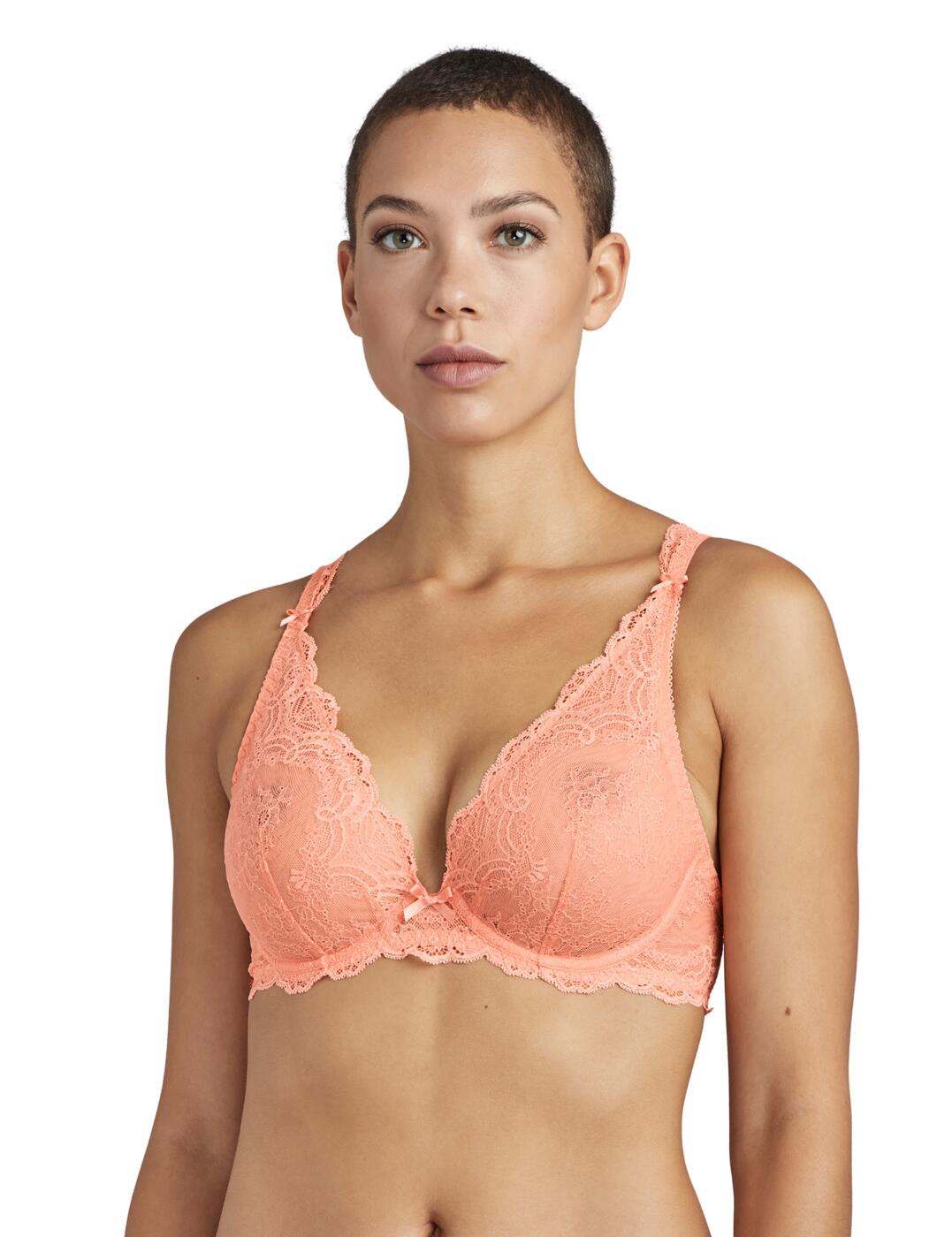 The Danse Des Sens collection uses luxurious lace combined with Aubade's elegant and flattering designs. This triangle bra has a deep plunge neckline for a sexy cleavage whilst the floral scalloped lace trim creates a feminine feel. Transparent lace cups are non-padded for comfort whilst showing a hint of skin for a seductive feel. Underwiring offers support and adjustable straps create an individual fit. Matching items available from the Danse Des Sens range by Aubade to complete your look.  Feminine premium lace Classic triangle design Plunging sexy neckline Adjustable straps for a unique fit Underwired Composition: 89% Polyamide &pipe; 11% Elastane Listed in UK sizes  48669-88347-1180166 OG12-6 Plunge Bra