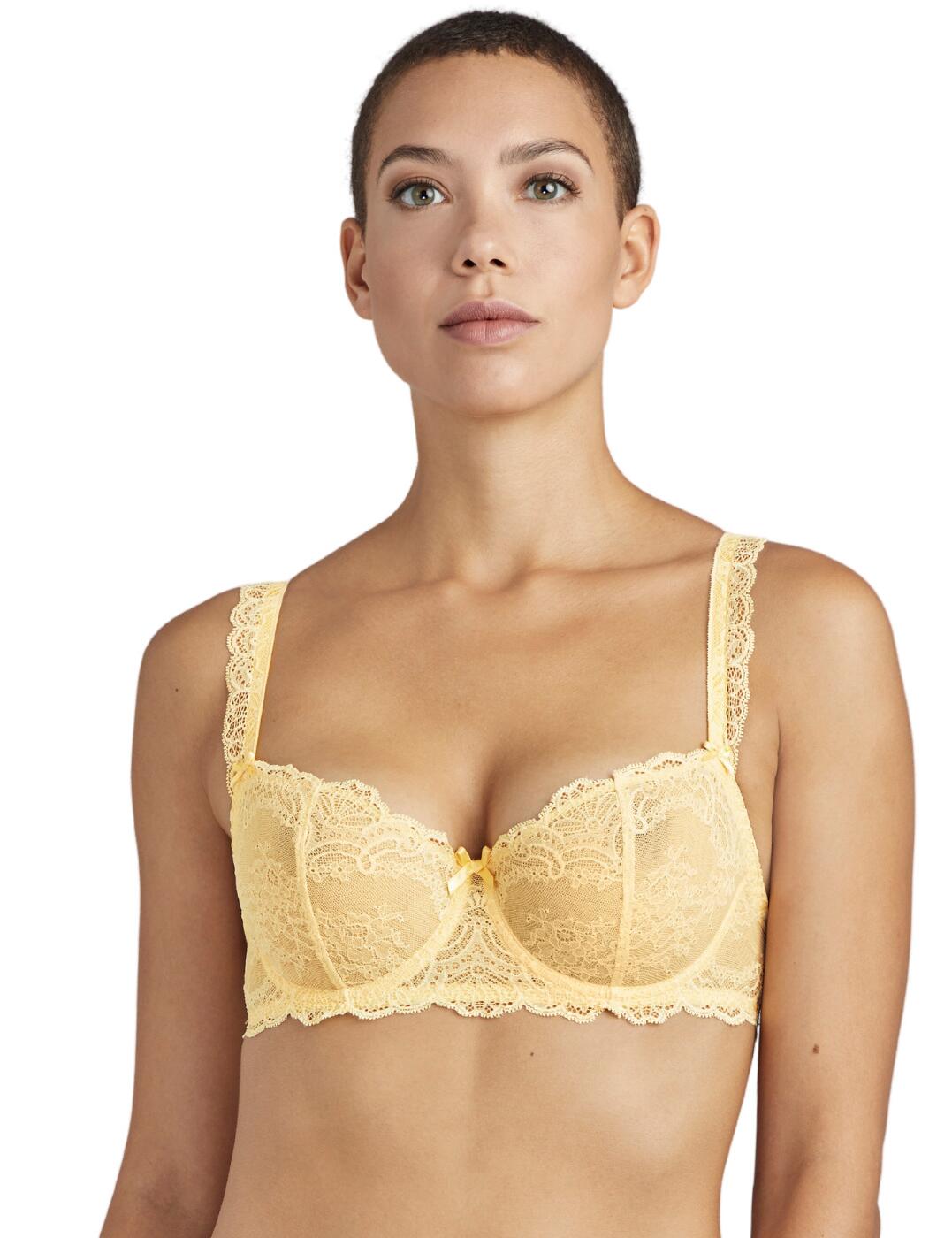 The Danse Des Sens embraces Aubades iconic sophisticated style with added premium lace for the ultimate feminine style. This classic half-cup shape bra has an all-over lace design with added lace trim for a luxurious finish.The vertical seams and half-cup design create a shape-enhancing push-up effect whilst non-padded opaque lace fabric shows a hint of skin for an ultra-sexy finish. Adjustable straps offer a unique fit whilst the underwiring creates support. Complete your look with matching items available from the Danse Des Sens range by Aubade.  Sexy transparent lace fabric Half-cup with push-up design Non-padded for comfort Adjustable straps for individual fit Underwired for support Composition: 89% Polyamide &pipe; 11% Elastane  Listed in UK sizes  48670-88348-1180217 OG14-6 Half Cup Bra