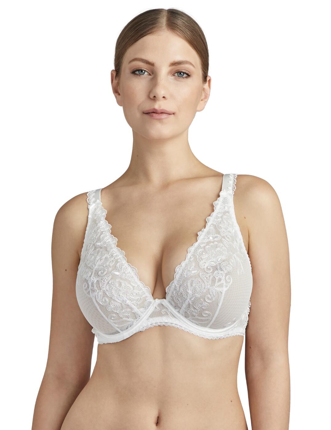 Make your big day extra special with the Pour Toujours collection which blends vintage and modern designs with Aubades recognisable French chic style. This triangle plunge bra has a guipure lace embellishment which frames the bust for a classic feminine style. The deep plunge neckline and opaque fabric add a sexy feel. Designed especially for larger sizes the underwiring offers needed support and the adjustable straps create a unique fit. Matching items available from the Pour Toujours collection by Aubade to complete your look.  Floral embroidery design Sexy transparent fabric Non-padded for comfort Underwired for support Adjustable straps for individual fit Composition: 42% Polyester &pipe; 41% Polyamide &pipe; 17% Elastane Listed in UK sizes  48674-88352-1171124 TC12-02 Plunge Bra