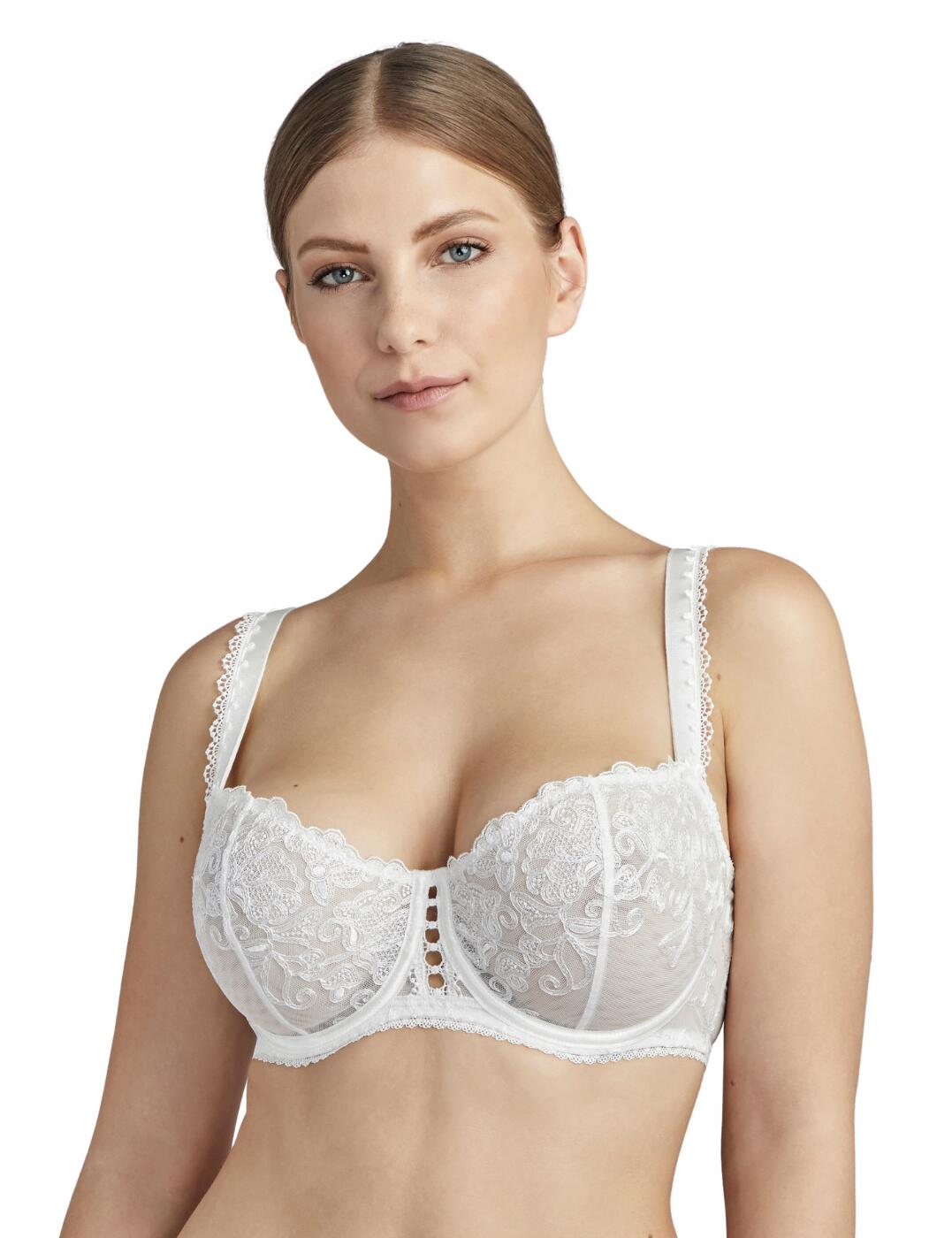 Pour Toujours is a sophisticated bridal collection from Aubade that blends vintage style and modern designs for the ultimate elegant lingerie you desire on your special day. The feminine floral embroidery and the central cut-out with guipure lace detail adds a bridal finish. Pretty scalloped lace edging complete the cups and straps whilst the bare skin subtly peeks through the transparent fabric for a sultry feel. Specially designed for larger bust sizes with reinforced back and underwiring for support and adjustable straps for an individual fit. Complete your look with matching items available from the Pour Toujours range by Aubade.  Guipure lace and floral embroidery Seductive transparent tulle fabric Half-cup design Adjustable straps for a unique fit Underwired Hook and eye closure Composition: 42% Polyester &pipe; 41% Polyamide &pipe; 17% Elastane Listed in UK sizes  48675-88353-1171136 TC14-02 Half Cup Bra