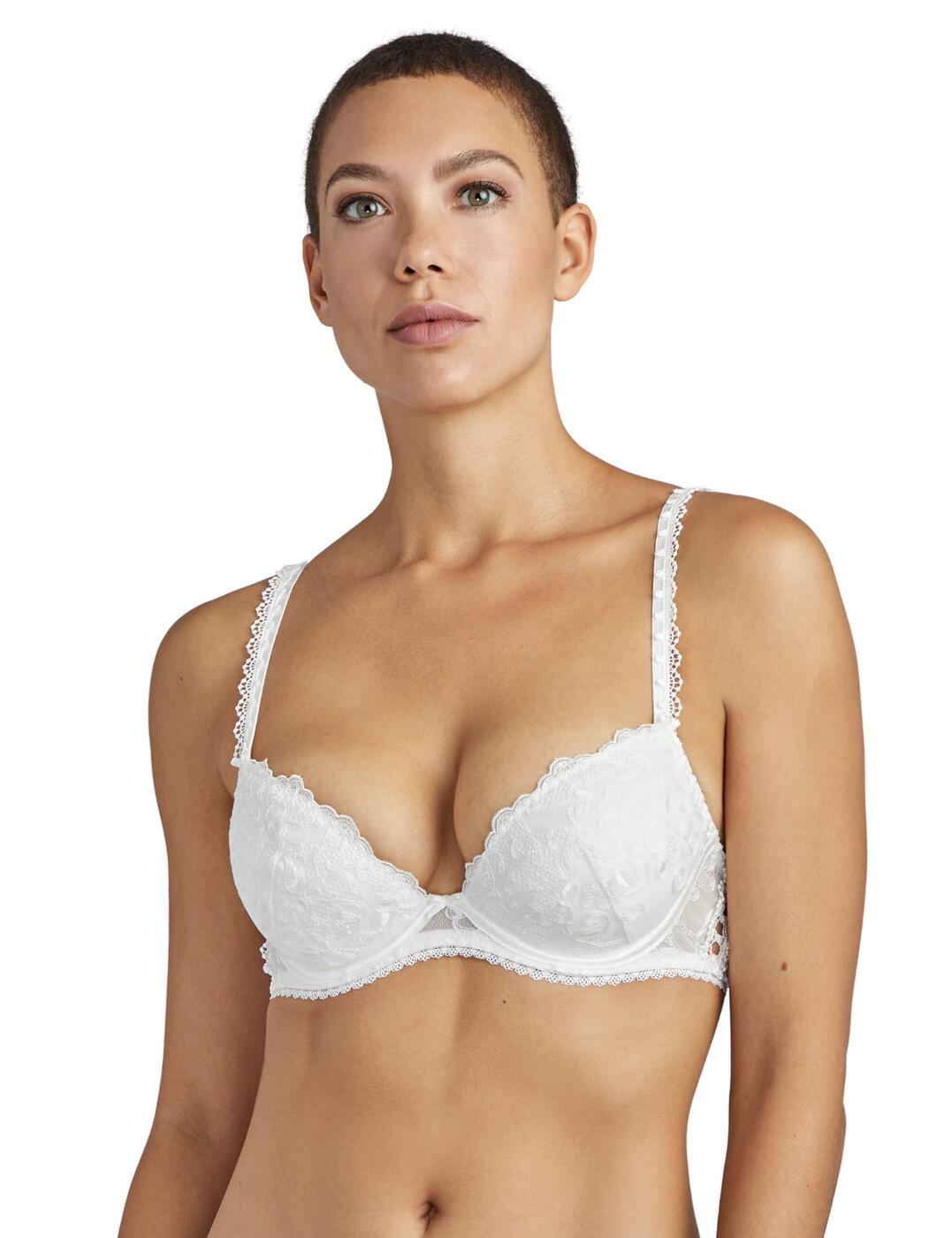 The exquisite bridal Pour Toujours collection from Aubade will make you feel extra special on your big day. The romantic lace and bridal style buttons add a vintage feel to the feminine floral design. This plunge bra has a deep neckline and the push-up padding creates a full, seductive cleavage. Underwiring adds support and the adjustable straps create an individual fit. Complete your look with matching items available from the Pour Toujours range by Aubade.  Feminine floral lace Sexy plunge neckline Bridal style buttons Underwired and padded cups offer support Adjustable straps for a unique fit Composition: 42% Polyester &pipe; 41% Polyamide &pipe; 17% Elastane Listed in UK sizes  48676-88354-1171152 TC18 Plunge Bra