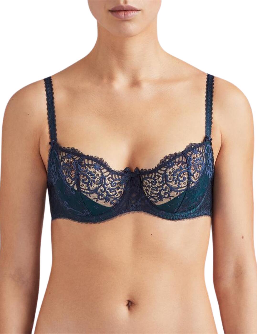 The Courbes Divines collection blends Calais Leavers and Jacquard lace with Aubades classic French designs for a sexy but feminine style. The luxury opaque lace panelling shows a hint of skin, combined with decorative satin lattice and bows creating an ultra-seductive look. The half-cup design shows moderate cleavage and the vertical seams form a push-up effect that emphasises your bust. Underwired for added support and adjustable straps for an individual fit. Complete your look with matching items available from the Courbes Divines range by Aubade.  Premimun Calais Leavers and Jacquard lace Half-cup design with push-up effect Sexy decorative satin lattice Adjustable straps for a unique fit Underwired for support Composition: Cup lace: 100% Polyamide Composition: Lace front back: 76% Polyamide &pipe; 24% Elastane Composition: Lining: 100% Polyester Composition: Cup lining: 70% Polyamide &pipe; 30% Elastane Listed in UK sizes  48705-88401-1171863 OA14 Half Cup Bra