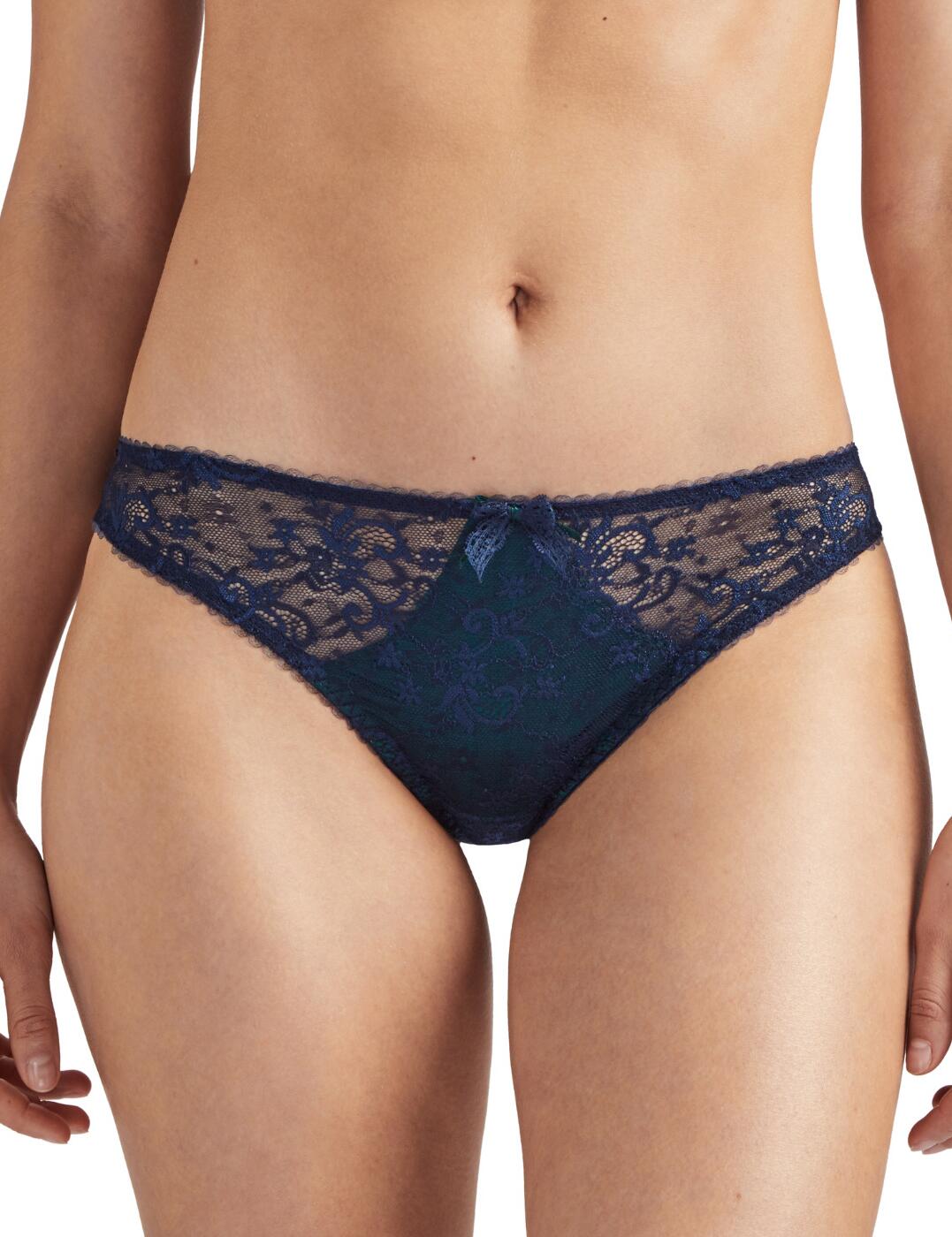 The Courbes Divines collection uses premium Calais Leavers lace combined with Aubades classic designs for the ultimate statement style. This tanga brief boasts a seductive design with a decorative lattice cut-out detailing and lace panelling which shows a hint of skin. The low rise and minimal coverage create a sexy design whilst the lace edge emphasises your curves. Matching items available from the Courbes Divines by Aubade to complete your look.  Calais Leavers lace Sexy tanga shape Low rise and minimal coverage Cut-out design with decorative lattice Composition: Front lace: 76% Polyamide &pipe; 24% Elastane Composition: Lace back: 80% Polyamide &pipe; 20% Elastane Composition: Front lining: 70% Polyamide &pipe; 30% Elastane Composition: Seat: 100% Cotton Listed in UK sizes  48707-88404-1171920 OA26 Tanga Brief