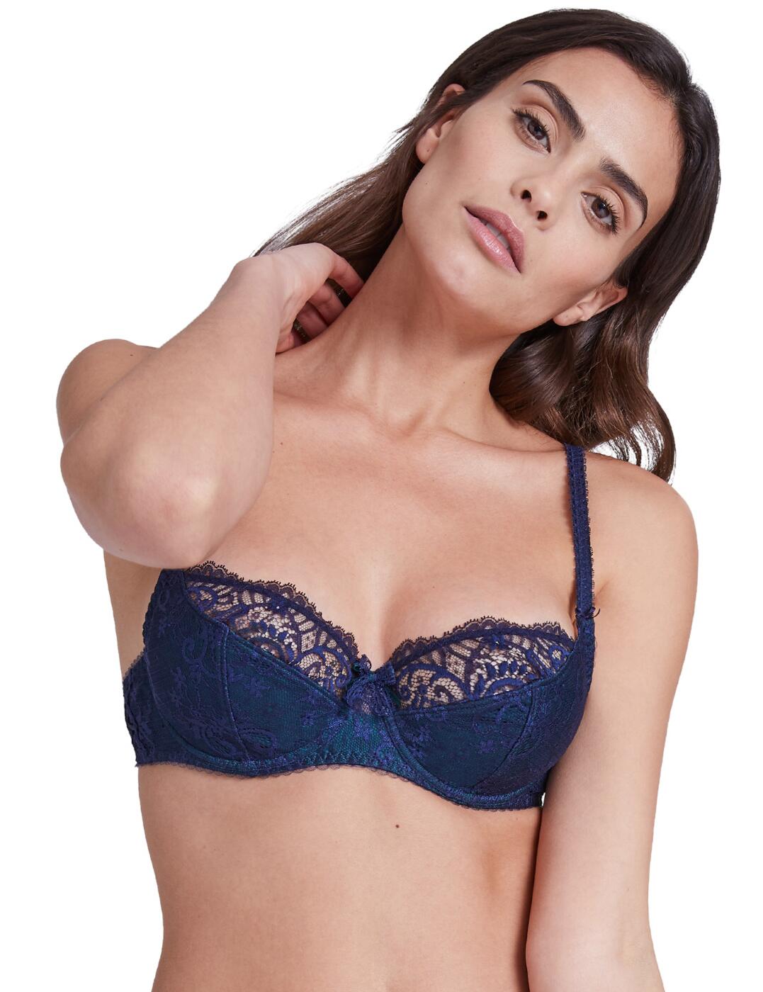 The Courbes Divines combines premium Calais Leavers lace with Aubades sophisticated designs for an extremely luxurious lingerie collection. This three quarter cup bra emphasises your bust with vertical seams which provide push up shaping. The moderate coverage features lace panelling and decorative lattice details which show a hint of skin for an extremely sexy style. Adjustable straps allow for an individual fit and the underwiring offers support. Complete your look with matching items available from the Courbes Divines range by Aubade.  Premium Calais Leavers and Jacquard lace Three quarter cup shape Satin and lace bow Adjustable straps for a unique fit Underwired for support Composition: Lace front back: 76% Polyamide &pipe; 24% Elastane Composition: Lace top cup: 100% Polyamide Composition: Lining: 100% Polyester Composition: Front lining: 70% Polyamide &pipe; 30% Elastane Listed in UK sizes  48720-88424-1172168 OA15 Push Up Bra