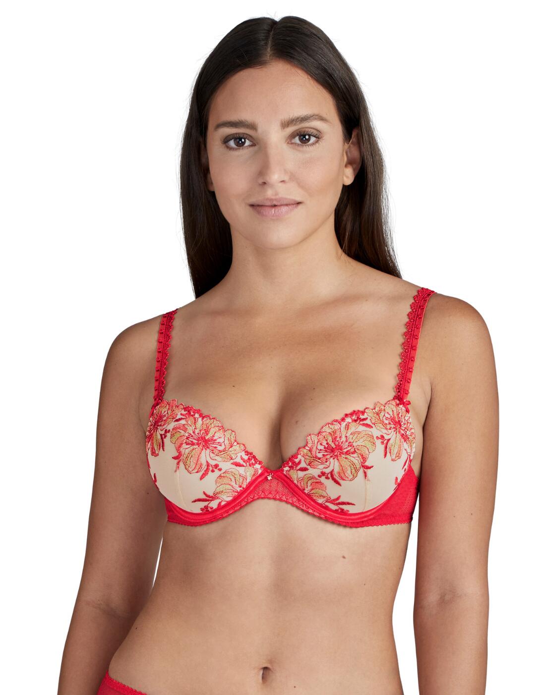 The Poetique Esquisse lingerie line draws inspiration from floral tattoos and blended with Aubuades recognisable sophisticated designs for a modern feminine collection. This plunge bra has intricate floral embroidery and contrasting dotted tulle for a striking sexy look whilst the central rhinestone and Guipure straps add a touch of luxury. The vertical seaming and moulded cups offer an enhancing push-up effect combined with the deep neckline for the ultimate seductive cleavage. Adjustable straps create a unique fit and the underwiring offers support. Perfect your look with matching items available from the Poetique Esquisse range from Aubade.  Feminine floral embroidery Rhinestone central detail Contrasting tulle fabric Timeless seductive plunge design Sexy deep neckline Moulded cups with underwiring for support Adjustable straps add an individual fit Composition: 38% Polyamide &pipe; 14% Elastane &pipe; 48% Polyester  Listed in UK sizes  48736-88449-1180410 TF18 Plunge Bra