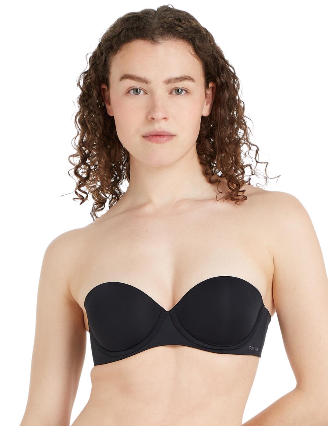 Elevate your outfits with the Calvin Klein strapless bra – the chic and stylish lingerie choice you’ve been waiting for. Its classic plunge neckline reveals just enough, while the moulded push-up cups provide excellent lift and support. The underwire support offers extra stability so that when you slip it on you know that it will stay in place no matter what. It has a hook and eye fastening for an adjustable fit and comes with removable adjustable shoulder straps that let you wear it your way. And don’t forget the signature Calvin Klein logo print on the side wing– to flaunt your designer choice!  Strapless push-up bra Plunging neckline Moulded push-up cups Underwired for support Hook and eye fastening Removable adjustable shoulder straps Calvin Klein logo print on the left wing Country of origin: China Composition: 80% Polyamide &pipe; 20% Elastane Listed in UK sizes  48406-87925-1164198 000QF5677E Strapless Bra