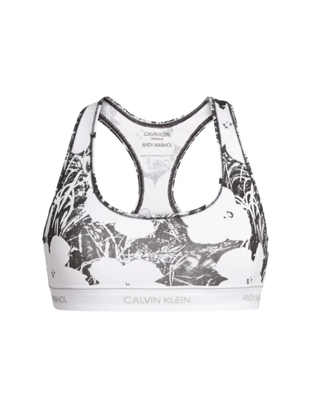 The Andy Warhol collection from Clavin Klein is the perfect blend of pop art design and athleisure style. This unlined bralette flaunts the iconic Calvin Klein underband with added Andy Warhol detail. The classic racerback design with non-padded cups offers the utmost comfort, perfect for everyday wear. Complete your look with matching items available from the Andy Warhol range by Calvin Klein.  Statement Calvin Klein x Andy Warhol underband Racerback design Non-padded and stretch fabric Comfortable soft fabric Composition: 53% Modal &pipe; 35% Polyester &pipe; 12% Elastane Listed in UK sizes  48839-88564-1189853 000QF5321E Bralette