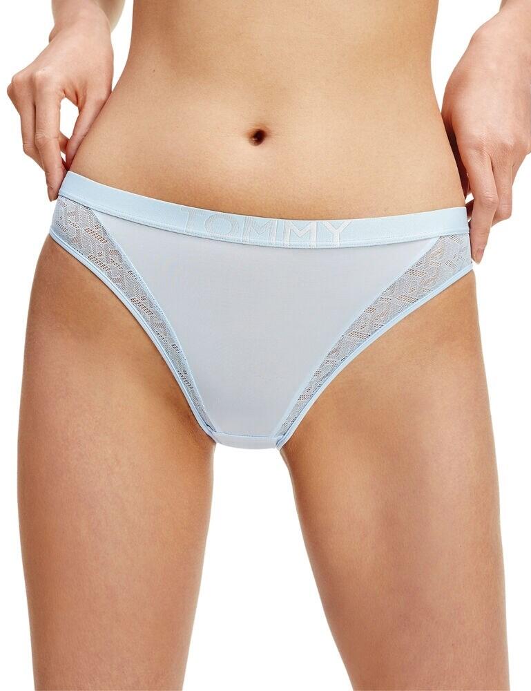 This brief combines style and comfort in one effortless package! This Tommy Hilfiger brief is crafted from soft microfibre which feels silky on the skin and stretches for a great fit. The front and back feature semi-sheer lace panels and the waistband have subtle branding. This is the ideal designer brief for everyday wear and for your loungewear collection.  Silky soft briefs Good coverage Subtle lace panels Composition: 84% Nylon &pipe; 16% Elastane Listed in UK sizes  46410-85164-1146433  Brief
