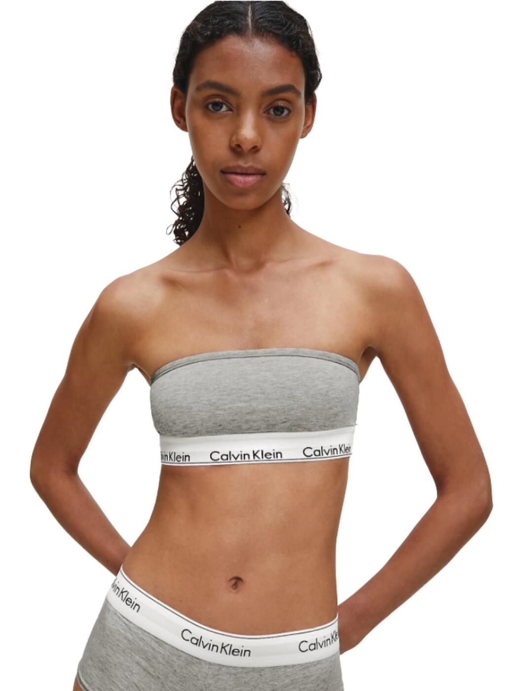 Minimal yet supportive, this bandeau bra from the Modern Cotton range at Calvin Klein will give you just the bust support you want from a loungewear bra. Crafted from a breathable cotton in a sporty look, this bra is effortless in design and feel. It has detachable shoulder straps so you can be versatile with style. This bra features the iconic standout Calvin Klein elastic underband.  Comfortable and minimalistic design Detachable shoulder straps Pull-on design Iconic CK elastic underband Non-wired Composition: 53% Nylon &pipe; 35% Modal &pipe; 12% Elastane Listed in UK sizes  48582-88214-1168155 QF5295E bandeau Bra