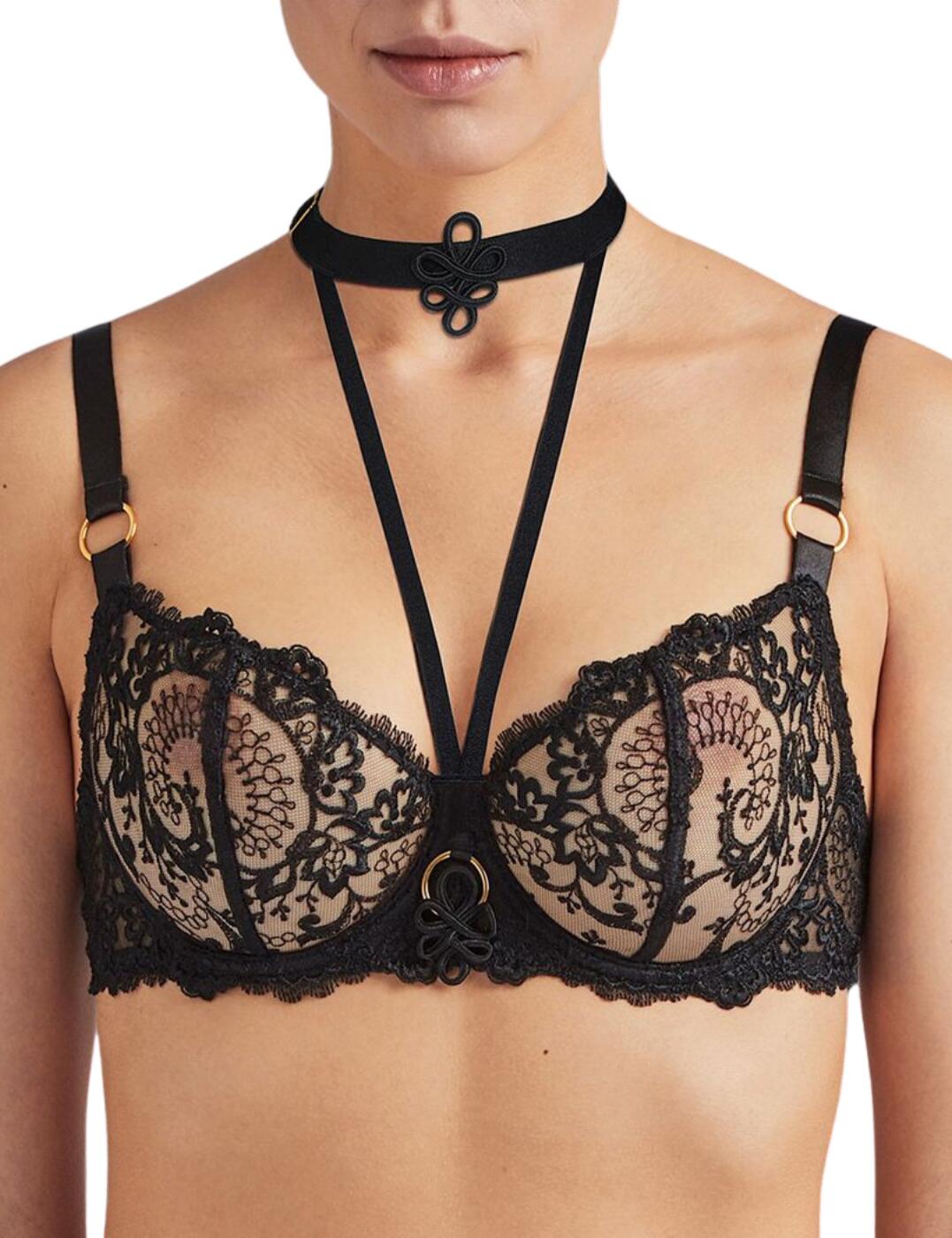 The La Reine De La Nuit range at Aubade translates as the Queen of the Night, which is exactly how you will feel adorning this bra. The cups are seductively sheer for a glimpse of skin beneath and embellished with intricate embroidery details. The cups are underwired in a half-cup design for a nice framing of your bust. The straps at the back feature a distinctive three-strap design, which not only adds a unique detail but extra support too. Large ring details add a bondage-style touch for a super-seductive look.  Seductive and glamourous design Underwired Half cups Sheer cups Removable collar Embroidery and ring details Distinctive three-strap design, adjustable Hook and eye closure Composition: 58% Polyester &pipe; 34% Polyamide &pipe; 8% Elastane Listed in UK sizes  50379-91211-1207130 QE14 Half Cup Bra