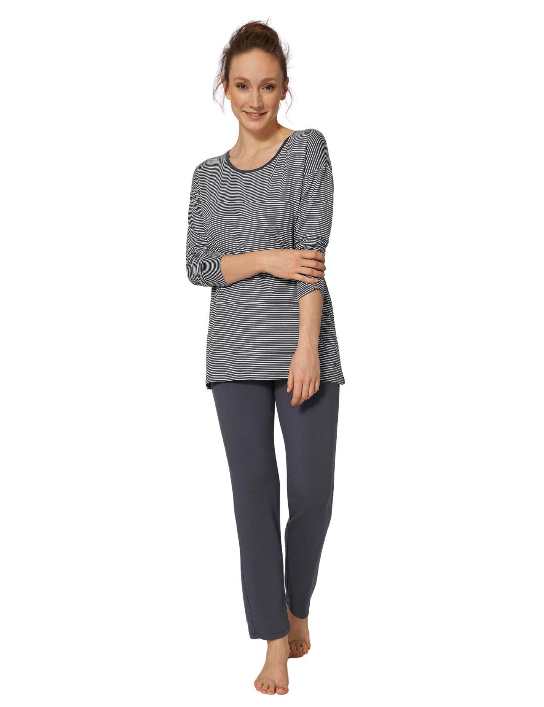 Sleep in complete comfort wearing this two-piece night set by Triumph. It is from the Stripes range and features a stripy top. The set includes a long sleeve top with long length bottoms. The top has horizontal stripes all over it while the bottoms feature a plain opaque design. it has a scoop neckline and is perfect for sleeping or lounging.  Two-piece night set Long-sleeve top with long length bottoms Stripe top Plain opaque bottoms Scoop neckline Comfortable fit Composition: 95% Viscose &pipe; 5% Elastane Listed in UK sizes  51563-93029 10205582  Pyjamas