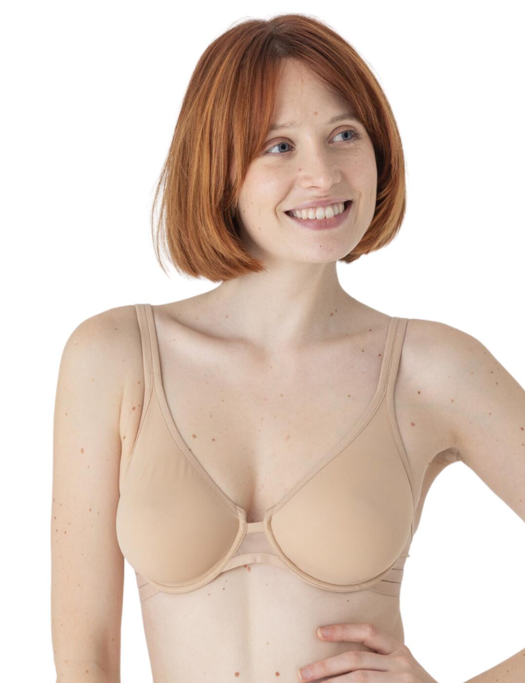 The classic design of this Nufit underwired bra from Maison Lejaby has a modern twist to it. The super-soft material on the moulded cups is sure to fit comfortably and discretely shape your bust. The tri-band design of the elastic underband gives this bra an interesting and stylish look while giving you the support and comfort that you need. As an additional little detail, the bridge in between the breasts is made out of a transparent mesh and has a cheeky cut for a bit of a deeper neckline.  Comfortable tri-band edging Full-cup design Hook and eye back closure Wide adjustable shoulder straps Moulded cups Underwired All materials are OEKO-TEX® certified Matching co-ordinates available Care: Hand wash Country of origin: Tunisia Composition: 74% Polyamide &pipe; 26% Elastane  Listed in UK sizes  53522-95944-1243364 171213 Moulded Bra