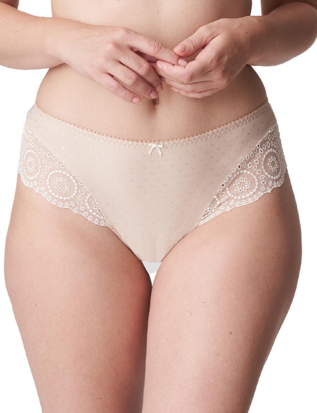 The Glamourous Osino luxury thong by Prima Donna boasts a flattering high leg cut that flatters both the hips and thighs. Delicate polka dot embroidery is seen across the soft opaque fabric, giving it a chic look. Soft scalloped lace adorns the hips giving a teasing glimpse of your curves. The minimal rear coverage highlights your curves.  Flattering high leg cut Flirty lace detailing Polka dot embroidery Country of origin: Tunisia Composition: Polyamide &pipe; 65% &pipe; Polyester 15% &pipe; Elastane &pipe; 13% &pipe; Cotton 7% Listed in UK sizes  54043-96743-1255630  Thong