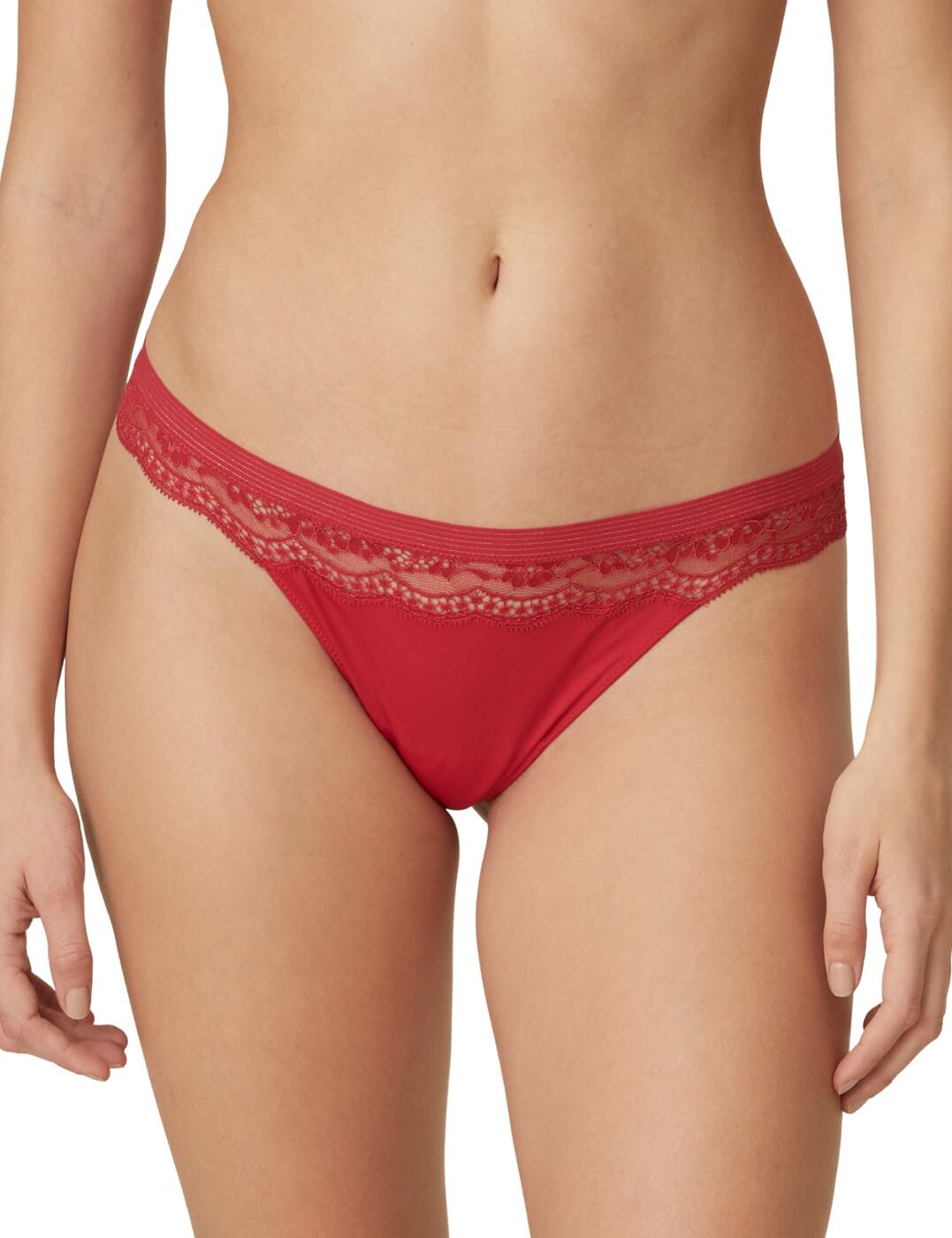 Gorgeous and stylish! This amazing thong from the Margot collection by Marie Jo will make you feel amazing. The style will certainly show off the natural shape of your bottom and give you the illusion of never-ending legs. A subtle pinstripe and glitter accent to the band along with the delicate lace just below ensures to leave you feeling sexy and feminine all throughout the day. Pair with a matching item to complete the look.  Pinstripe and glitter band Delicate lace Shows off your natural shape Sexy feminine design Composition: 77% Polyamide &pipe; 17% Elastane &pipe; 6% Cotton  Listed in UK sizes  49151-89087 0602320 Thong