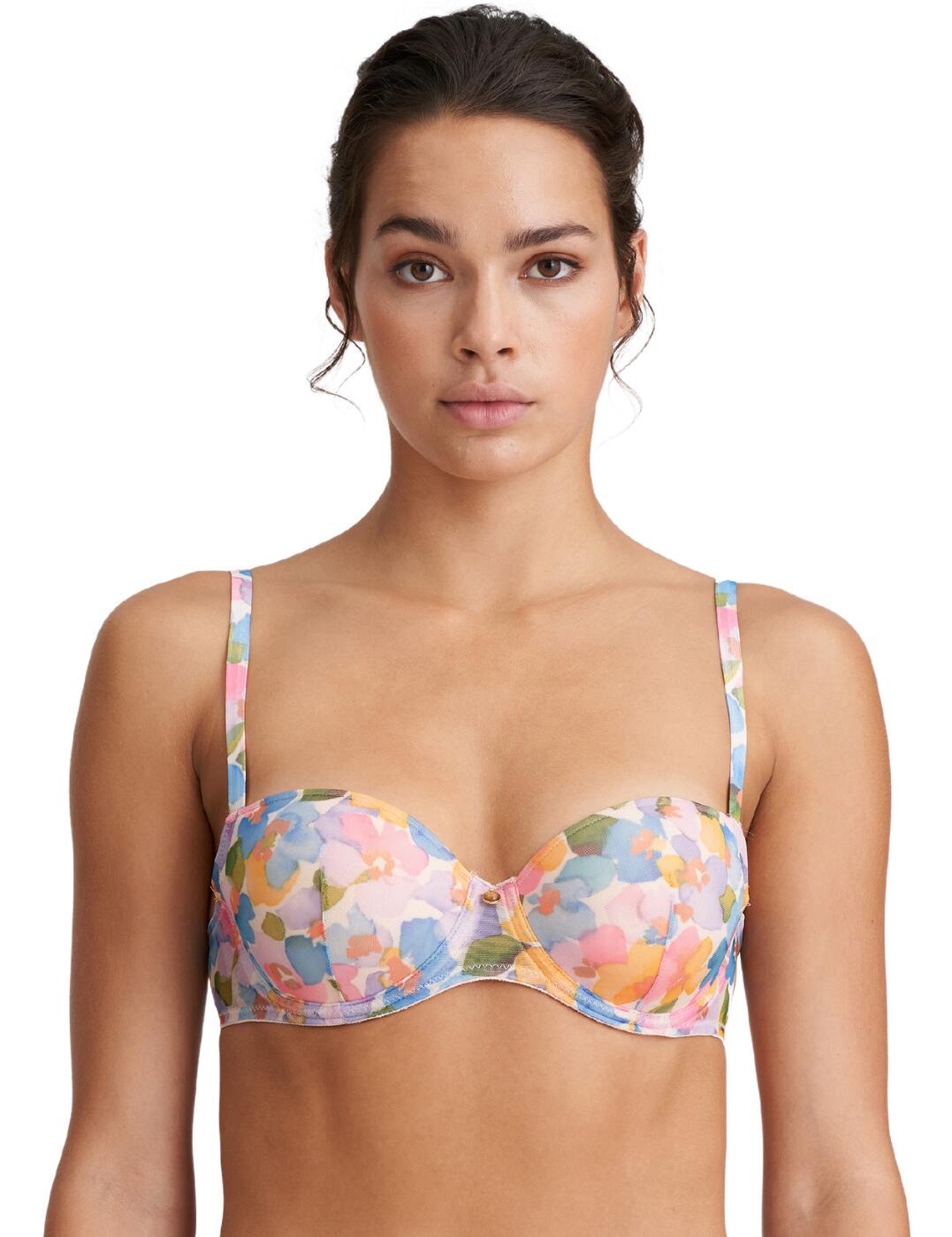This Taro balcony bra exudes feminine charm and combines the comfortable and luxurious designs only Marie Jo can give you. The smooth fabric makes sure that your lingerie remains invisible under tight-fitting clothing, and the soft material feels amazingly indulgent against your skin. The underwired padded cups shapes your bust providing a flattering fit, while the adjustable shoulder straps and the hook and eye back closure make sure that you can adapt this bra to your best fit. A cute little diamante detail in between the bust adds a bit of charm to this captivating design.  Smooth patterned material Hook and eye back closure Adjustable shoulder straps Padded Underwired Country of origin: Tunisia Composition: 63% Polyester &pipe; 32% Polyamide &pipe; 5% Elastane  Listed in UK sizes  54114-96830-1261505 0122229 Balcony Bra