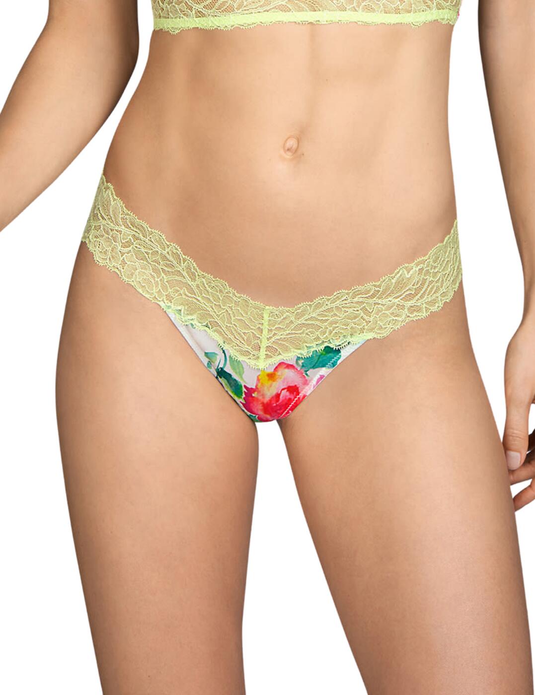 Look and feel gorgeous in this short thong from the Flower range by Andres Sarda. The delicate lace along the entire band adds an elegant touch. These thongs are created with such thin material that they will appear almost invisible under any clothing. Pair with matching items to finish the look.  Delicate lace Invisible finish Minimal coverage Composition: 79% Polyamide &pipe; 15% Elastane &pipe; 6% Cotton  Listed in UK sizes  49204-89178-1192139 3309155  Thong