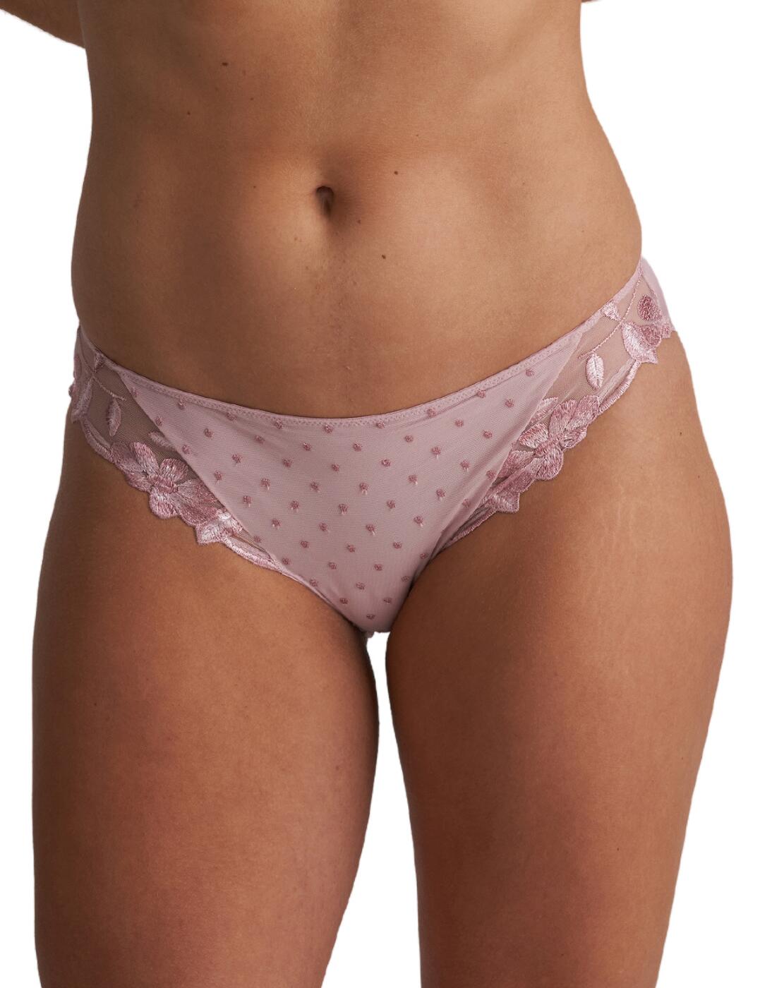 Bring a touch of elegance and refinement to your lingerie collection with this luxurious Rio brief from the Agnes range by Marie Jo! The raised dot pattern across the front combines with the delicate floral embroidery along the legs to craft a romantic and feminine aesthetic that exudes sensuality. What's more, the use of lightweight tulle fabric, a low-rise waist, and good rear coverage, perfectly ensure both a flattering fit and lasting, all-day comfort! Pair with a matching bra from the Agnes line for a sophisticated yet playful ensemble!
