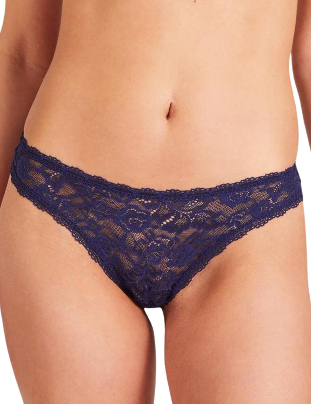 The Rosessence collection from Aubade blends pure sensuality and premium comfort, making this Tanga brief an essential for anyone's lingerie drawer. Slip into the everso divine floral lace Tanga brief, adorned with a tulle trim to add a touch of romance to any occasion. The absolutely gorgeous and incredibly flattering high leg cut combined with the highly cheeky rear fit makes this piece an absolute dream for those who want to exude confidence and pure sex appeal.  So sexy, a must-have! Highly elastic soft lace trim Elastic tulle to frame your silhouette Aubade-inscribed jewel on the rear A cheeky rear fit Low-rise, high leg cut, extremely flattering Country of origin: Madagascar Composition: Front Lace: 85% Polyamide &pipe; 15% Elastane Composition: Back Lace: 82% Polyamide &pipe; 18% Elastane Composition: Seat: 100% Cotton Listed in UK sizes  54881-97855 HK26-6 Tanga Brief