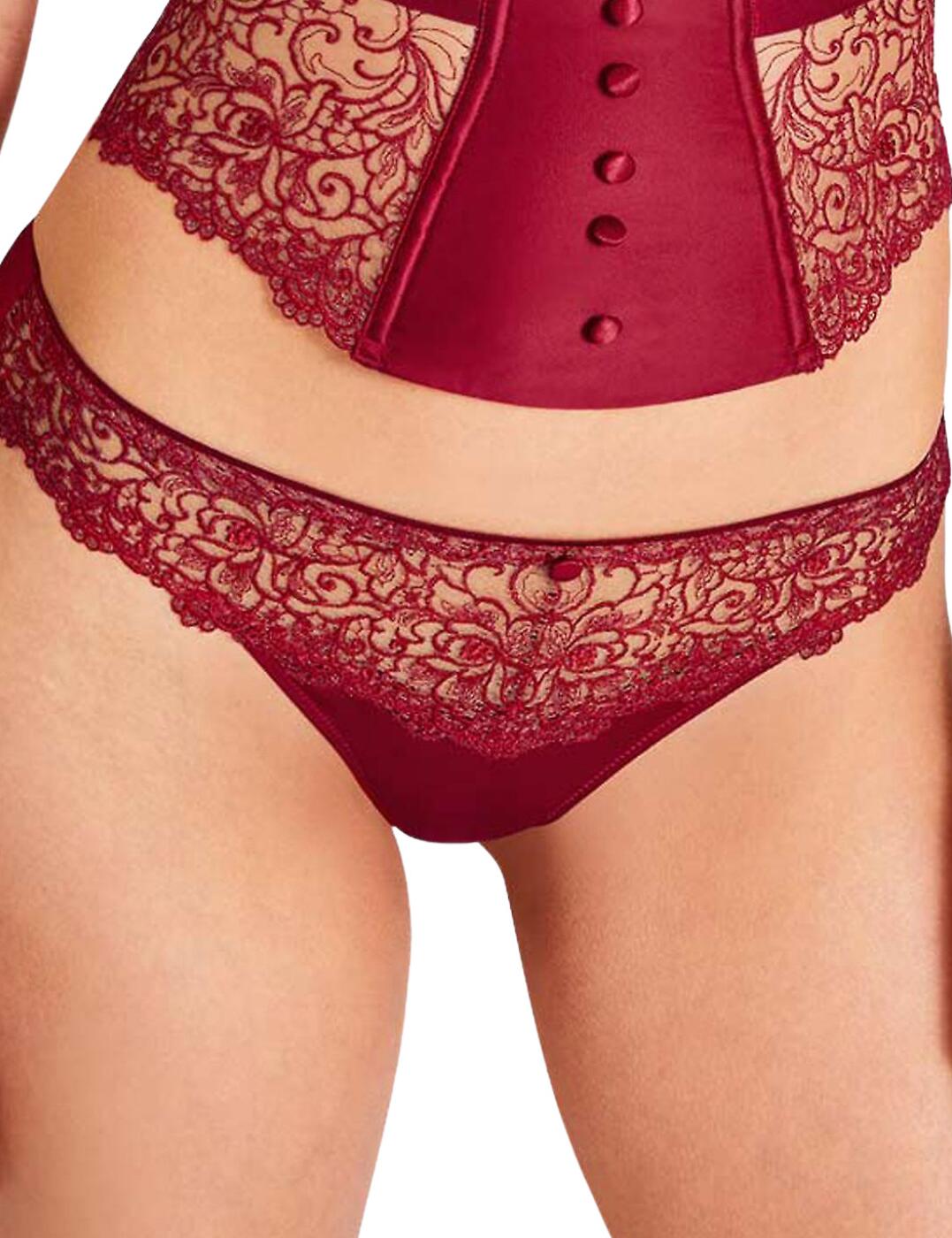 Parisian style with edge, the Karl Lagerfeld X Aubade Miss Karl collection has it all. Slip into something more comfortable with the tanga brief, exceedingly sultry yet full of bold attitude. Make a statement with the incredibly feminine guipure-style Swiss embroidery and soft satin panelling for a comfortable yet gorgeous look. Features a high cut leg and a low rise waist perfect for enhancing your beautiful silhouette. A perfect addition to your lingerie drawer.  Seductive and feminine Guipure-style Swiss embroidery Low rise waist Wider cut sides, extremely comfortable and extremely sexy High leg cut Country of origin: Tunisia Composition: Front Embroidery: 85% Polyester &pipe; 15% Cotton Composition: Seat: 100% Cotton Composition: Knit: 84% Polyester &pipe; 16% Elastane Composition: Tulle Back: 100% Polyester Listed in UK sizes  54885-97859-1279682 UC26  Tanga Brief
