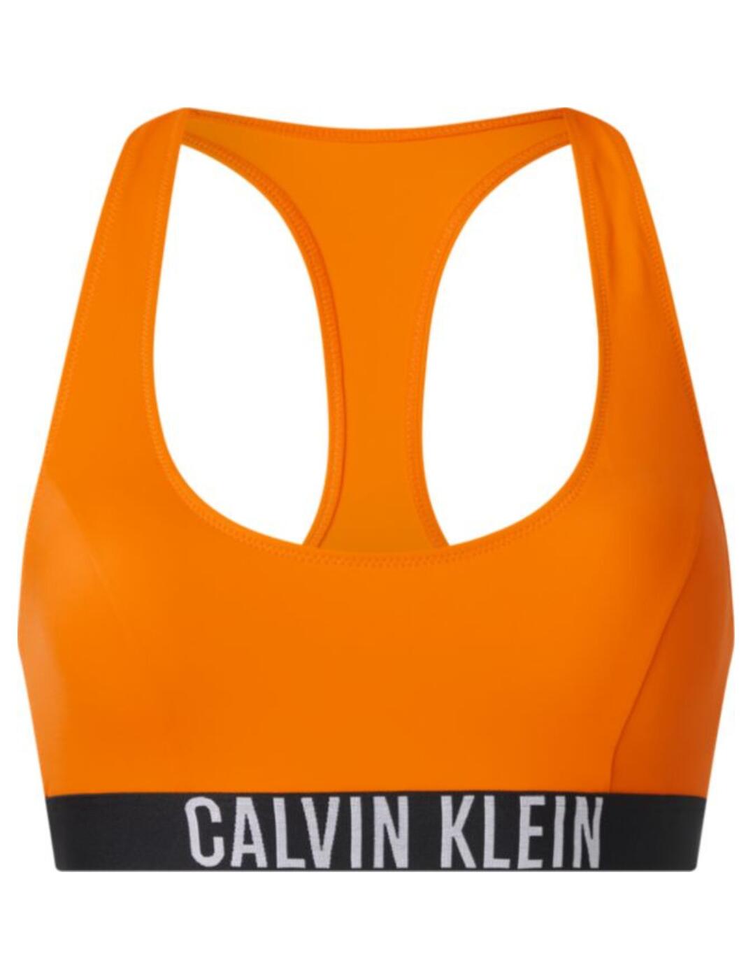 Calvin Klein blends comfort with minimalistic modern athleisure in the Intense Power collection. This racerback bikini top combines the classic Calvin Klein bralette cut with a stylish athleisure aesthetic. Cut with racerback straps, which allow greater freedom of movement and are perfect for even weight distribution, making this piece incredibly comfortable and ideal for those high cardio days. Cute logo detailing on the elastic underband for a stylish twist to a traditional design.  Scoop neckline Made from 78% sustainably sourced fabrics Racerback design Soft moulded cups with removable padding Signature Calvin Klein logo detailing Pull-on design Country of origin: Vietnam Composition: 78% Recycled Polyamide &pipe; 22% Elastane Listed in UK sizes  56583-100355-1301177 KW0KW01839  Full Cup Bikini Top