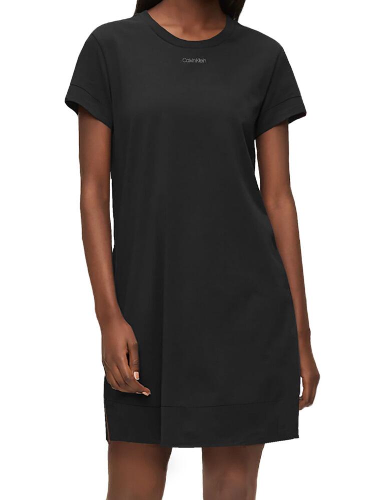 The CK Reconsidered collection will make you look good and feel good, by using a blend of recycled fabrics this collection will help you sleep easily. This nightdress flaunts a bold contrasting Calvin Klein logo on the front and back for a minimal designer chic style. Made from a blend of recycled fibres this nightdress doesn't compromise on quality and offers the softest stretch jersey. The loose-fitting oversized T shape with a crew neckline and short sleeves creates a comfortable design that is perfect for sleepwear.  Calvin Klein signature on front and back Made from recycled fibres Short sleeves and mid-length Super soft stretch jersey fabric Composition: 57% Cotton &pipe; 38% Recycled Polyester &pipe; 5% Elastane Listed in UK sizes  49234-89230-1181422 QS6703E Nightwear