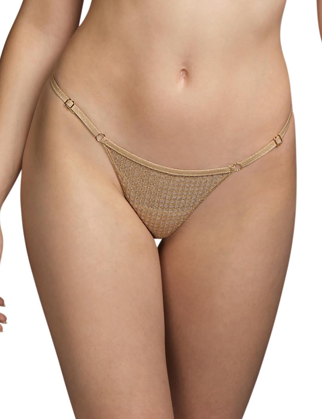 Add something a little different to your lingerie drawer with this Tharp luxury thong by Andres Sarda. This thong features a front section of embroidery with transparent sequins with shimmery strap detailing at the sides which are adjustable allowing for 2 sizes to fit all. It has metal rings at the centre adding an elegant touch. The thong is a low-rise style with minimal rear coverage. It has the Tharp sheer floral lace at the rear for a sexy look.  Luxury thong Front section of the embroidery with sequins Shimmery straps that are adjustable for 2 sizes to fit all Mental ring detailing Low-rise Minimal rear coverage Classic Tharp floral lace at the rear Country of Origin:- Spain Composition: - 73% Polyamide &pipe; 17% Cotton &pipe; 7% Elastane &pipe; 3% Polyester  Listed in UK sizes  54622-97426-1264074 3310859 Thong