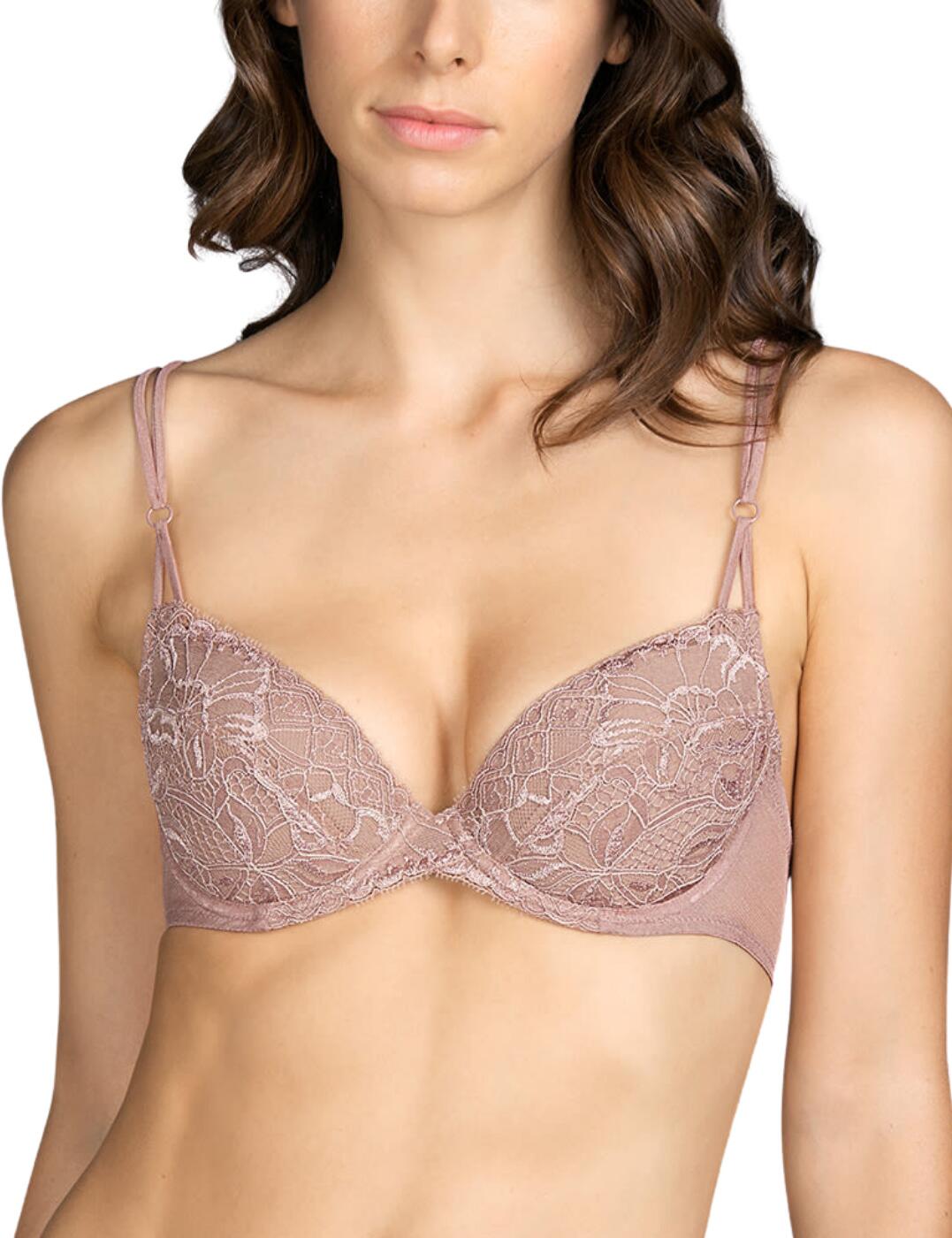 Are you looking for that extra lift? Look no further than this push-up bra from Andres Sarda's Mini Range. The removable pads offer an amazing amount of lift creating a truly gorgeous cleavage, extra padding puts this push-up bra above the rest. Delicate flowery lace on the cups making this the most beautiful bras within your lingerie collection. Adjustable double straps with tone-to-tone decorative rings and hook and eye closure create a fantastic team in helping you get the right fit for all-day wear.  Decorative ring on straps Adjustable double straps Hook and eye closure Removable pads Extra padding for extra oomph Composition: 52% Polyester &pipe; 35% Polyamide &pipe; 9% Cotton &pipe; 4% Elastane Listed in UK sizes  49246-89249-1192167 3309217  Push Up Bra
