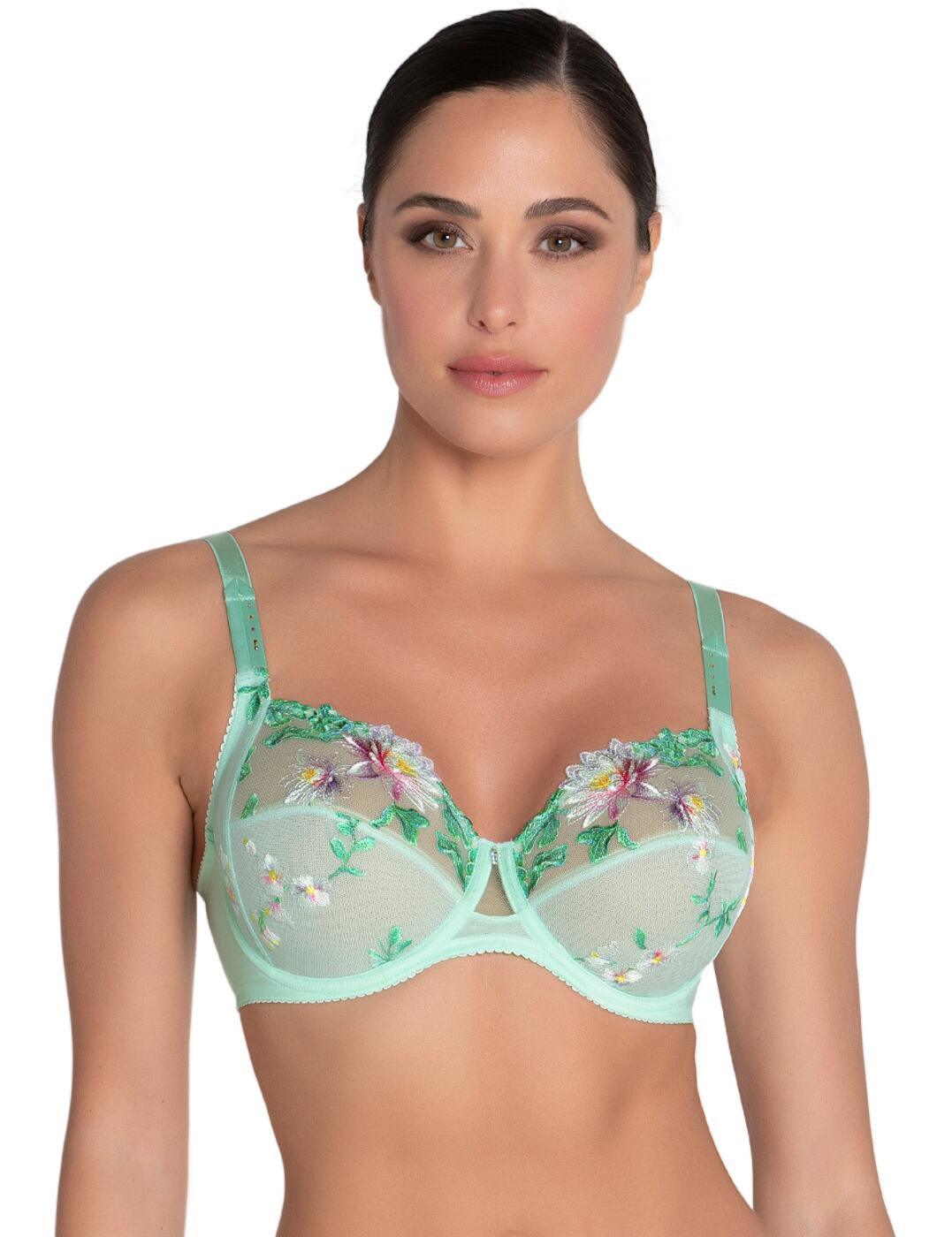Experience the luxurious style and comfort of this exquisite Lise Charmel Amour Nymphea 3-part full-cup bra. This full-cup bra offers a lot of stability and support, thanks to its three-part cups that are designed to perfectly fit your body. The cups are non-padded, which gives you a natural look. Meanwhile, the beautiful tulle fabric on the cups is adorned with sumptuous floral embroidery that adds an alluring touch to this bra. In the centre, you'll find a sexy cut-out with charm adding more glamour to this piece. Equipped with adjustable thicker stretchy straps, as well as toned tulle lining at the back for additional support, it guarantees superior fit and comfort all day long. Adding a unique sparkle to your ensemble are the coloured rhinestones on the straps. Transform yourself into an angelic goddess by pairing it with its matching lingerie pieces available.
