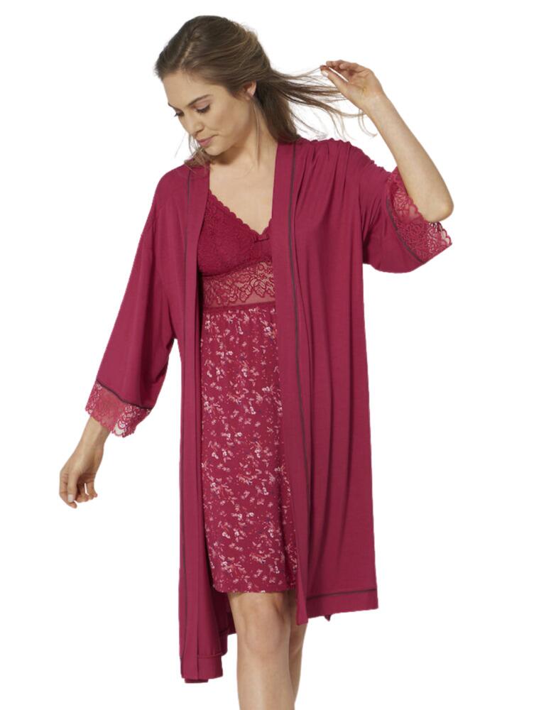 Add this light and feminine robe from the Amourette Spotlight range at Triumph to your lingerie wardrobe, perfect wear whether relaxing on the sofa, stepping out the bath or snuggling up in bed. The lightweight medium-length design makes for easy wear for a cover-up. It is crafted from high-quality, pleasant-to-the-touch fabric for a comfy feel. A waistband tie allows you adjustability in coverage. The sleeves are 3/4 length, finished with sheer floral lace trims for added elegance to this robe.  Lightweight and soft fabric Knee-length Waistband tie 3/4 sleeves with floral lace trim Composition: 95% Viscose &pipe; 5% Elastane Listed in UK sizes  49306-89346 10202412 Robe