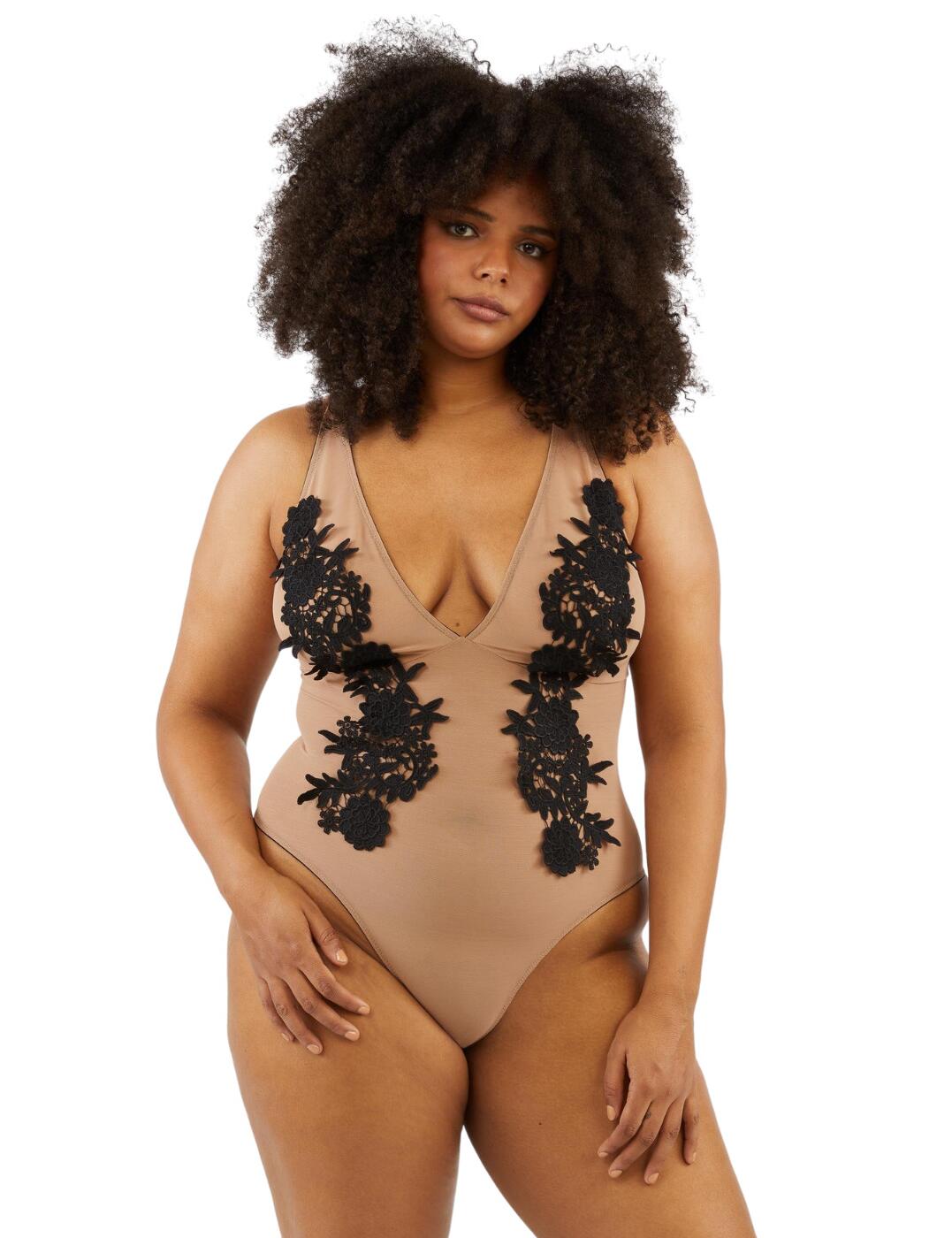 Feel incredible in this mesh and black embroidery body by Playful Promises. From the Alaina range, it features a natural style that gives the illusion of a sheer design with a floral embroidery overlay down each side of the body. This body has a deep plunging neckline that showcases your cleavage and ensures a comfortable fit with a hook and eye closure as well as adjustable straps. The back has a cut-out underneath the closure adding a sexy feel and provides full rear coverage.  Embroidery body Sheer illusion design with a floral embroidery overlay Plunging neckline Hook and eye closure and adjustable straps Cut-out underneath closure Full rear coverage Country of Origin:- China Composition:- Main: 100% Polyester Composition:- Main 2: 76% Polyamide &pipe; 24% Elastane Composition:- Main 3: 100% Polyamide Composition:- Gusset Lining: 100% Cotton &pipe; Excluding trims Listed in UK sizes  55510-98965-1293711 PPGBD086 Body