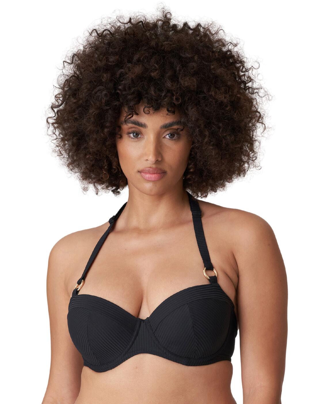 A new firm favourite to add to your swimwear collection. A timeless and elegant black piece from the Sahara collection by Prima Donna. This piece styles a slightly plunging sweetheart neckline, with supple padded cups that allow slight exposure of your uplifted cleavage thanks to the flawlessly placed underwiring that offers you firm support without a restrictive feeling. Fine structured fabric is used across the piece for a vintage inspired goal with a modern twist. Added gold decals contrast against the main body of the piece to create a luxurious look. The straps can be removed at the rear and cross for an adaptable styling, and placed into a racerback if you desire an even more secure fit.
