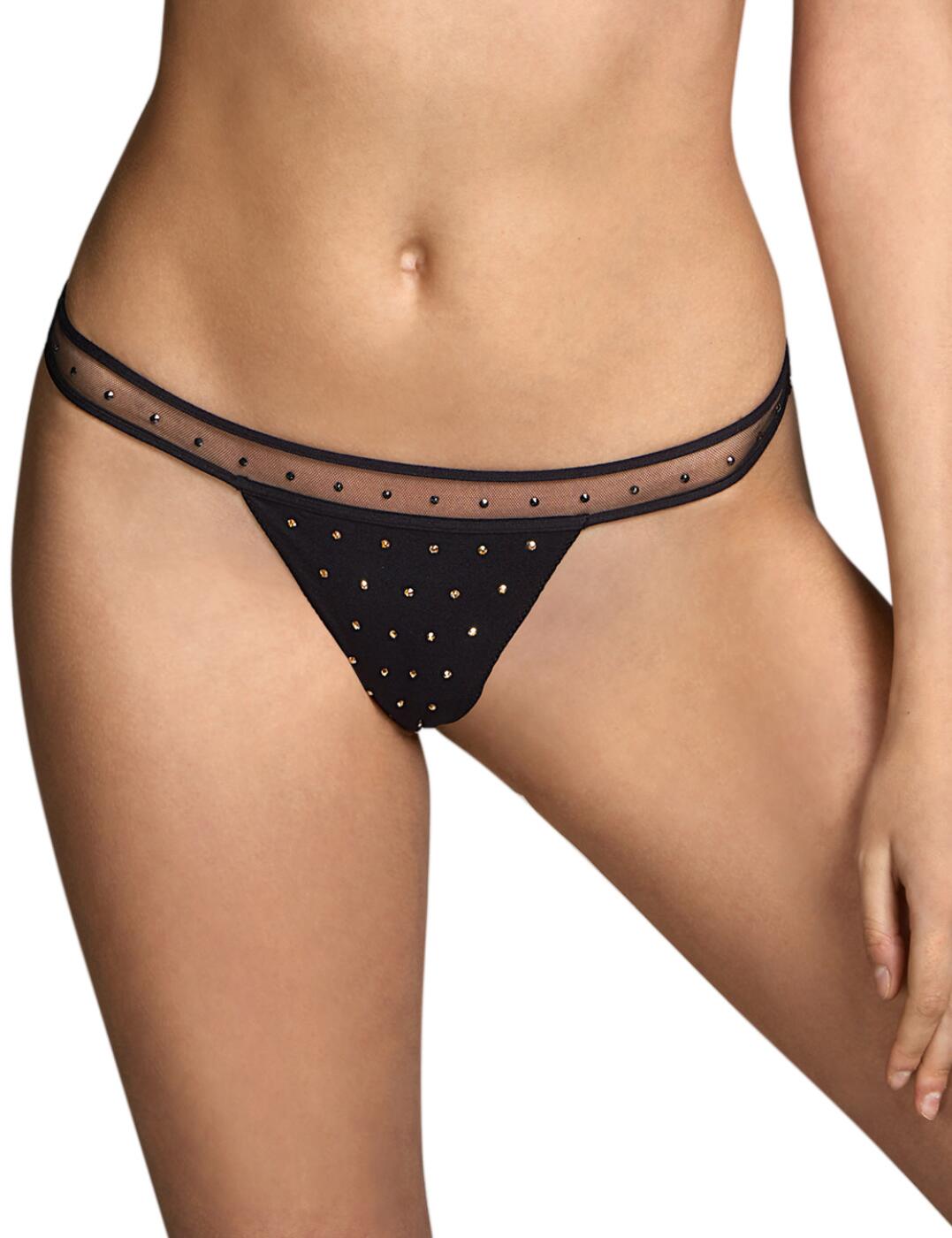 The Switzer luxury thong by Prima Donna is a real show stopper. The minimalistic design of this thong keeps all of the attention on you. A slim waistband is finished with dazzling embellishments that will catch the light as you move. The high-leg cut showcases your hips and creates the illusion of longer legs. An opaque front and rear preserves modesty, making the minimal design feel all the more alluring. Pair with the matching bra from the collection for a coordinated look.  High leg cut Slim waistband Minimal rear coverage Adorned with crystals Country of origin: Tunisia Composition: 71% Polyamide &pipe; 18% Elastane &pipe; 11% Cotton  Listed in UK sizes  55663-99135-1284530 3311153 Thong