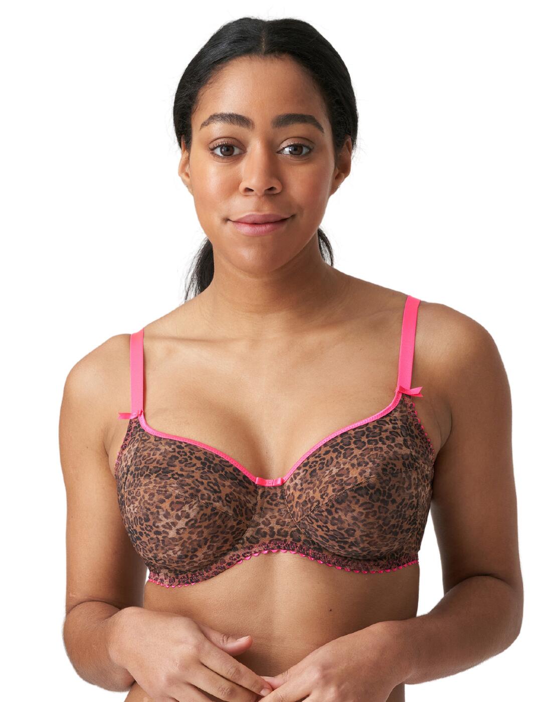 Indulge your inner wild side with the luxurious Cafe Plume collection by Prima Donna Twist. This statement full cup bra boasts a bold animal inspired print and vibrant contrasting trim adding a flirty look to the classic shape. The picot trim detail and bow embellishments add subtle luxurious finishes. Non-padded cups offer a comfortable fit and create a naturally rounded shape. The 3-section cup design and underwiring offer support and uplift. Adjustable shoulder straps create the perfect individual shape. Matching briefs are available from the Cafe Plume collection by Prima Donna Twist.  Flirty animal print Luxurious picot trim Full cup coverage Underwired for support Non-padded 3-section cup design Adjustable shoulder straps Hook and eye closure Small fit: Size up one cup size from your usual Prima Donna size Country of origin: Tunisia Composition: 67% Polyamide &pipe; 25% Elastane &pipe; 8% Polyester Listed in UK sizes  55680-99159-1285314 0142170 Full Cup Bra