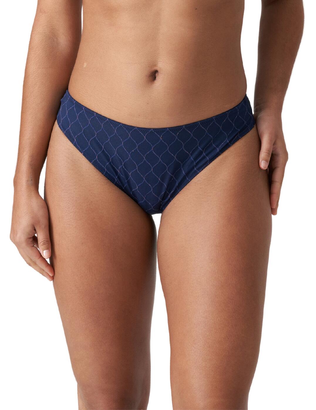 Give your everyday lingerie a new mesmerising touch with the gorgeous Chryso collection from Prima Donna Twist. These thongs are made especially for the classy, stylish ladies, who want to reveal a touch of their tempting curves, while still maintaining an elegant and feminine vibe. The eye-catching geometric pattern on the front makes this piece easily stand out, while the soft stretch material makes sure that your everyday lingerie is as comfortable as it is beautiful.  Geometric pattern on the front Semi-sheer small panels on the back Mid-rise waist Minimal rear coverage Matching coordinates available Country of origin: Tunisia Composition: 77% Polyamide &pipe; 14% Elastane &pipe; 8% Cotton &pipe; 1% Polyester  Listed in UK sizes  55701-99183-1285802 0641960 Thong