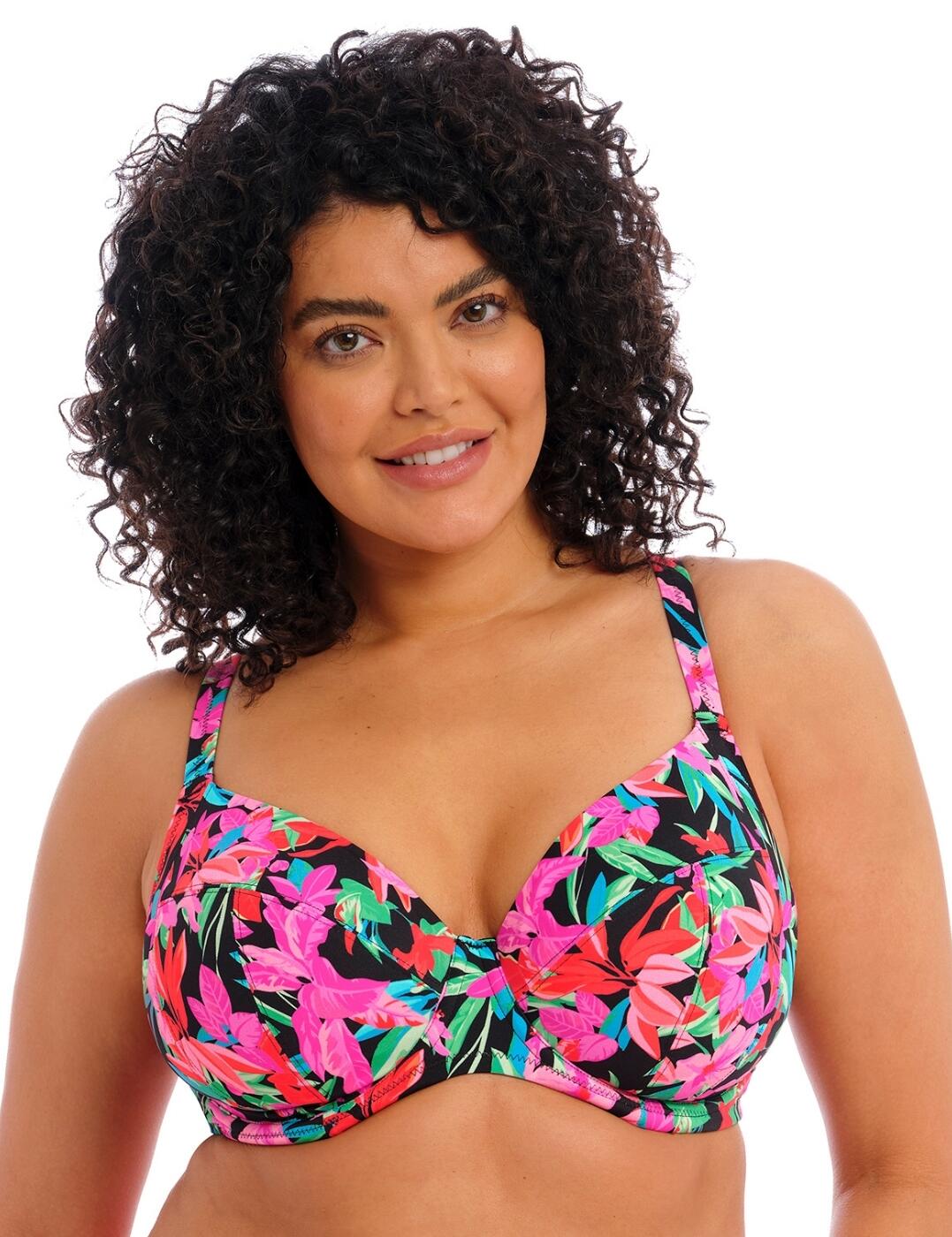 Update your swimwear wardrobe with the new Elomi Savaneta plunge bikini top. With a vibrant tropical style, this top has everything you need to feel confident and chic while you soak up the sun. A plunge neckline gives it a modern touch, while underwired cups ensure a secure and comfortable fit. Adjustable shoulder straps let you get the perfect fit from the neckline, and non-padded cups keep your silhouette looking natural. Additionally, Powernet lining gives extra support and security, with a secure clip fastening for perfect coverage every time. Plus, matching swimwear is available so you can coordinate flawlessly all summer long! Whether strolling on the beach or lounging by the pool, you’ll be looking stylish in the Savaneta collection.  Tropical vibrant style Plunge neckline Underwired for support Adjustable shoulder straps Non-padded for a natural look Powernet lining Secure clip fastening Matching swimwear available Country of origin: Indonesia Composition: 84% Polyamide &pipe; 16% Elastane Listed in UK sizes  59898-104685-1371825 801302 Plunge Bikini Top