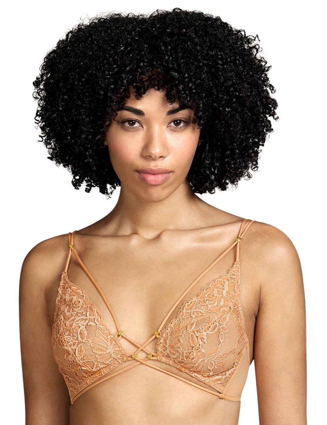 Feel sexy and comfortable all day long in this soft wireless bra by Andres Sarda. From the Nadia range, it brings a playful vibe with multi-layered straps that wrap around the bust with gold charm detailings. The cups are made from semi-sheer lace that lays softly against your skin creating a super comfortable fit along with the wire-free design. It has adjustable straps and a hook and eye closure to allow for an individual fit. Matching items are available.  Soft wireless bra Playful design with multi-layered strap around with gold charm detailing Semi-sheer lace Super comfortable fit with wire free design Adjustable straps and a hook and eye closure for an individual fit Country of origin: Tunisia Composition: 91% Polyamide &pipe; 9% Elastane  Listed in UK sizes  55823-99322-1286452 3311319  Non-wired Bra