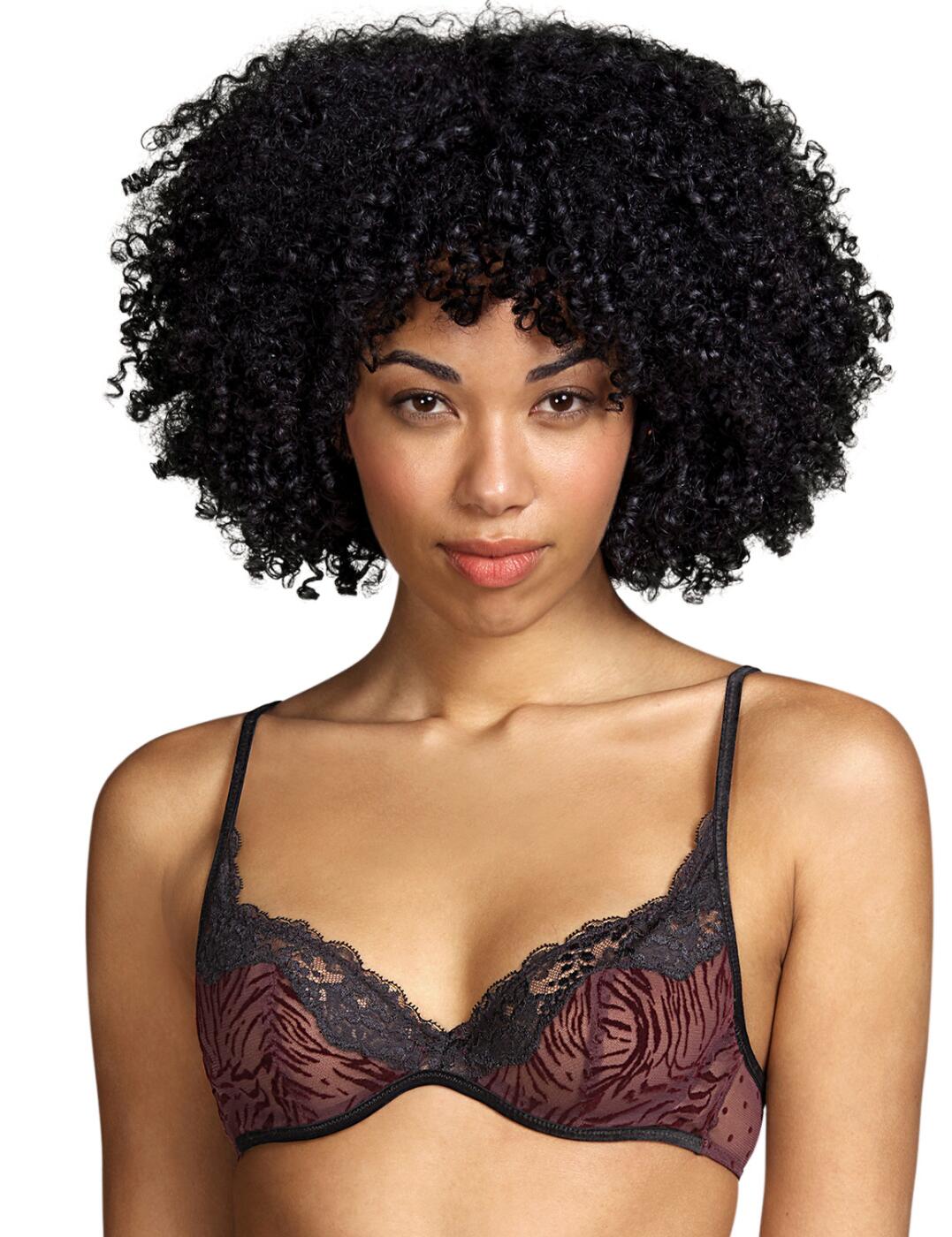 The Fraser range by Andres Sarda brings fun lingerie with a mixture of prints and textures. This full cup wire bra will become a new favourite with animal print cups, a polka dot print on the rear under band and delicate lace across the neckline. It provides full coverage with a slightly plunging neckline that ehnaces your bust. The bra has an invisible underwire that provides great support and cup sizes D+ have additional support from wider straps and a reinforced back panel. It has adjustable straps and a hook and eye closure for an individual fit. Matching items are available to create a fully stylish look.  Full cup wire bra Animal print on cups with polka dot print on under band Delicate lace neckline Slightly plunging neckline Invisible underwire Additional support in cup size D+ with wider straps and reinforced back panel Adjustable straps and a hook and eye closure for an individual fit Matching items are available Country of origin: Tunisia Composition: 92% Polyamide &pipe; 8% Elastane  Listed in UK sizes  55829-99337-1287299 3311013  Full Cup Bra