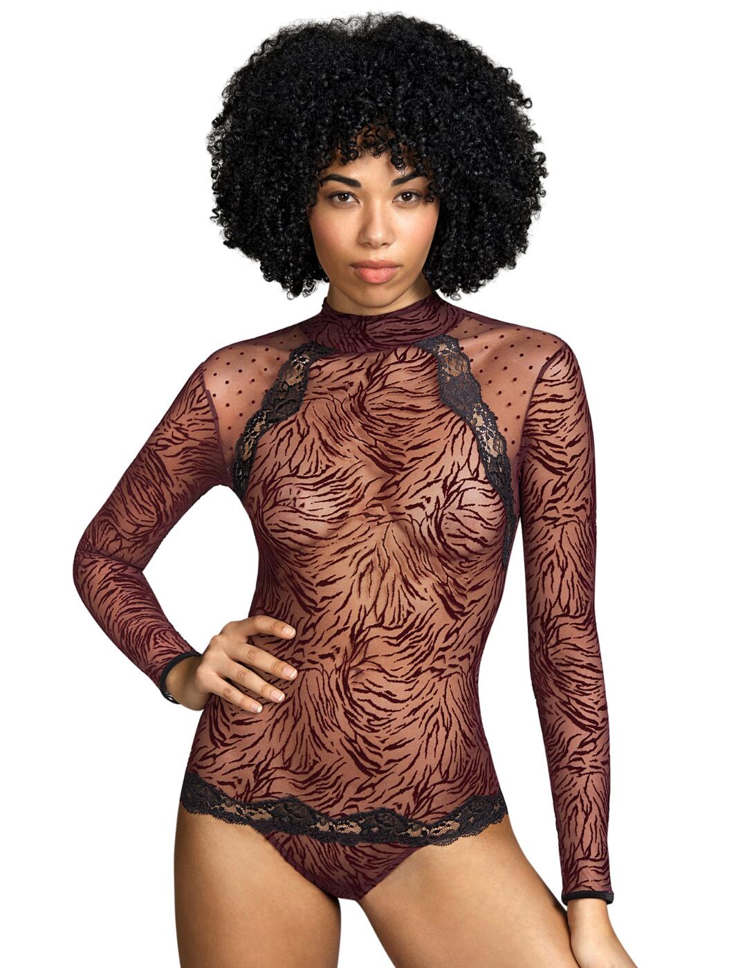 This Fraser body will leave all eyes on you with its incredible fun and flirty design. From Andres Sarda, this body will ensure comfort and be made from great materials to add a luxurious touch to your outfit. It has the classic Fraser range prints with an all-over animal print and polka dot print at the shoulders with soft lace detailing throughout. The body has a high neck and long sleeves making it perfect to wear with a pair of jeans or spice up any outfit. It closes at the neck with a clasp closure and features a keyhole cut out underneath for a sexy feel.  Flirty body All-over animal print with polka dot print at the shoulders Delicate lace throughout High neck Long sleeves Clasp closure at the neck with a keyhole cut-out underneath Country of origin: Tunisia Composition: 89% Polyamide &pipe; 9% Elastane &pipe; 2% Cotton  Listed in UK sizes  55833-99340-1287392 3311040  Body