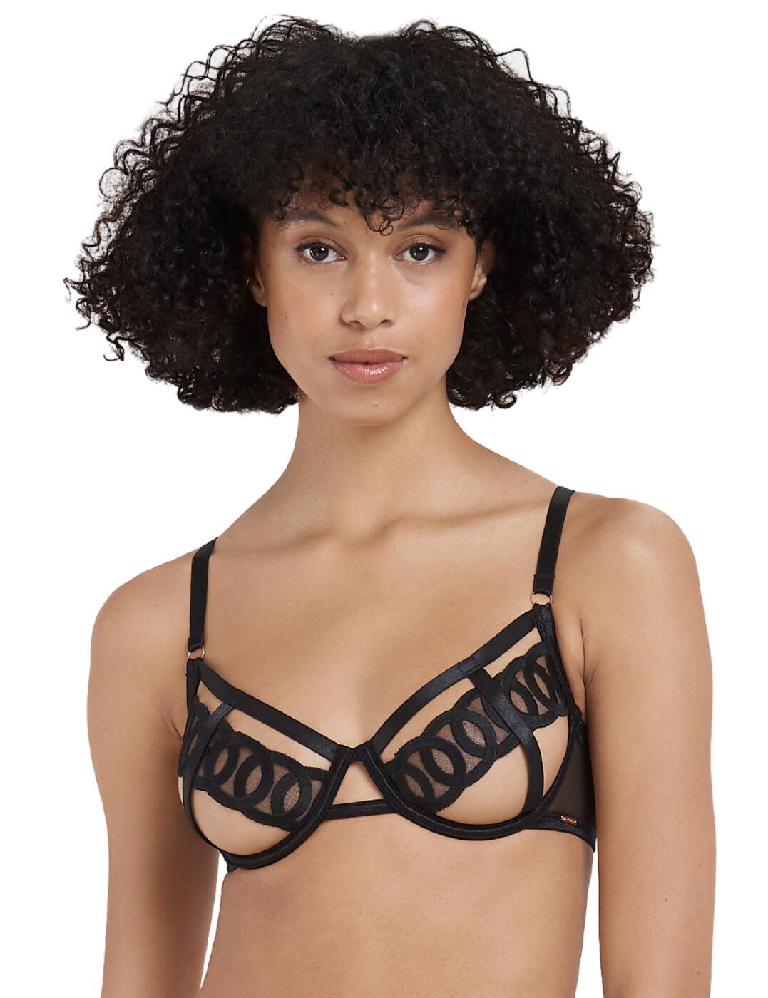 The Bluebella Juliette cut out bra is the perfect combination of striking contemporary design with a luxurious edge. The elegant slimline banding forms the main structure of this piece and is overlaid with intricately embroidered circles that add a sculptural dimension to the look. Featuring an open-cup style, with coverage provided by a central embroidered band, you can feel confident and sultry in your lingerie. Adjustable shoulder straps let you tailor the fit for optimum comfort and support and underwired cups provide added lift and definition. A hook and eye closure on the back completes this look and allows for easy fastening. You can add to this alluring look with matching Juliette coordinates to indulge in confidence tonight!  Hook and eye rear closure Adjustable shoulder straps Underwired Non-padded cups Matching items available Embroidered open cup design Country of origin: China Composition: 46% Polyester &pipe; 46% Polyamide &pipe; 8% Elastane Listed in UK sizes  59949-104738-1376811 41220 Plunge Bra