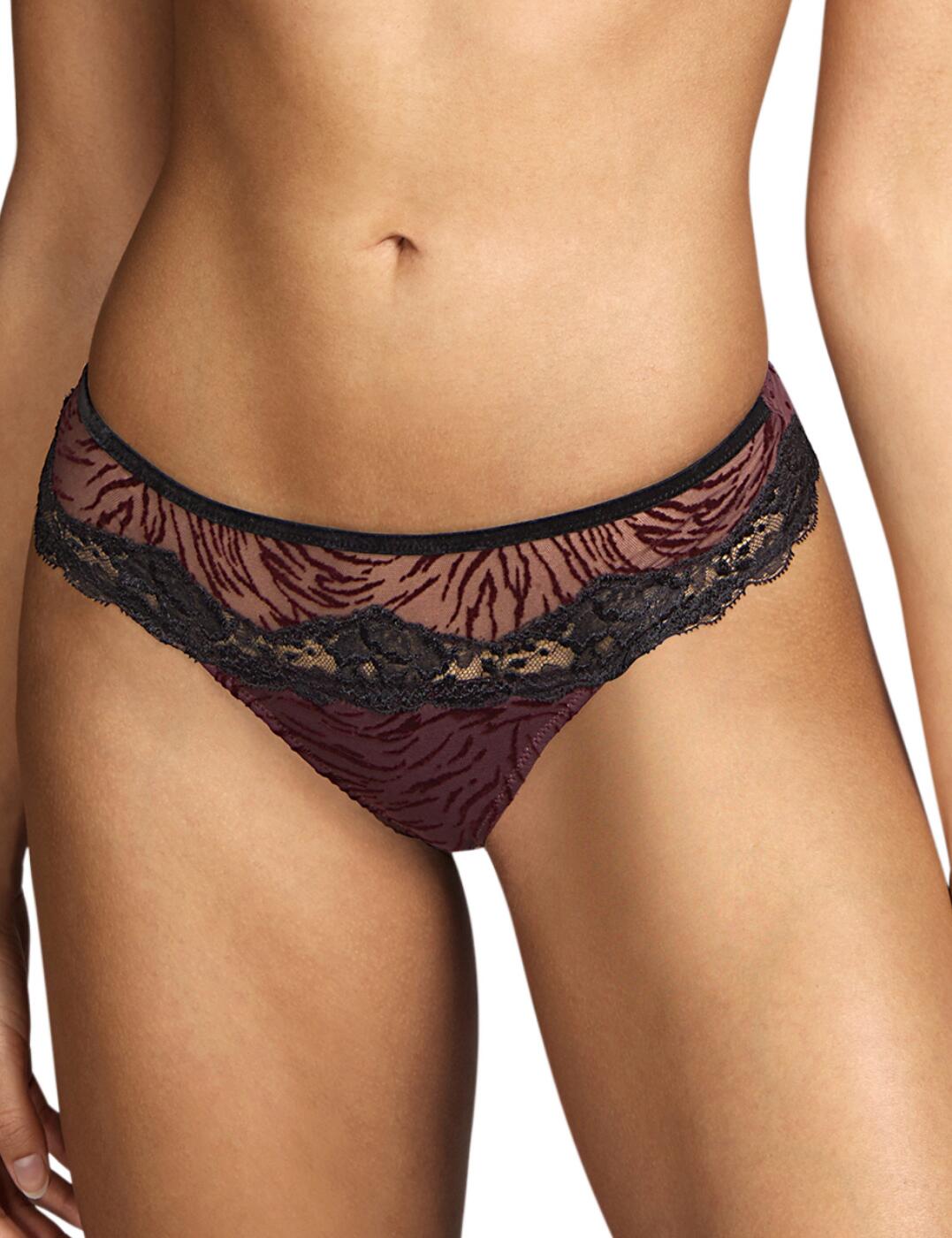 This short thong is a part of the Fraser range by Andres Sarda. It features an animal print across the front section with a polka dot print at the rear. The brief has a lace panel across the front and the outline of the rear creating a flirty look. It has a low-rise waist and provides a classic thong rear with minimal coverage. Matching items are available to create a fully coordinated flirty look.  Short thong Animal print across the front section Polka dot print rear Lace detailing Low-rise waist Minimal rear coverage Matching items available Country of origin: Tunisia Composition: 76% Polyamide &pipe; 16% Cotton &pipe; 8% Elastane  Listed in UK sizes  55834-99342-1287421 3311055  Thong