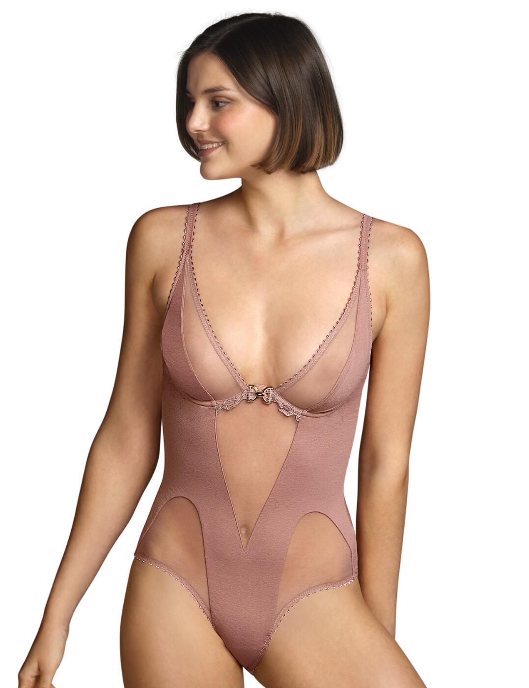 The Switzer range by Andres Sarda creates incredible lingerie pieces that will you leave feeling elegant and sexy and this body will do exactly that! All eyes will be on you with mesh panels that showcase your silhouette and plain opaque sections that will create an illusion of a curvier figure. It has a deep plunging neckline that flatters your cleavage and is underwired for support. Andres Sarda provides all the luxury finishes with cute scallop edges and a centre statement chain charm. The rear is fully sheer with a thong shape cut out and it provides medium rear coverage.  Sexy body Mesh panels that showcase your silhouette Deep plunging neckline Underwired for support Luxury finishes with scallop edges and centre chain charm Fully sheer rear with thong shape cut out Country of origin: Tunisia Composition: 73% Polyamide &pipe; 22% Elastane &pipe; 5% Cotton  Listed in UK sizes  55842-99350-1287786 3311140  Body