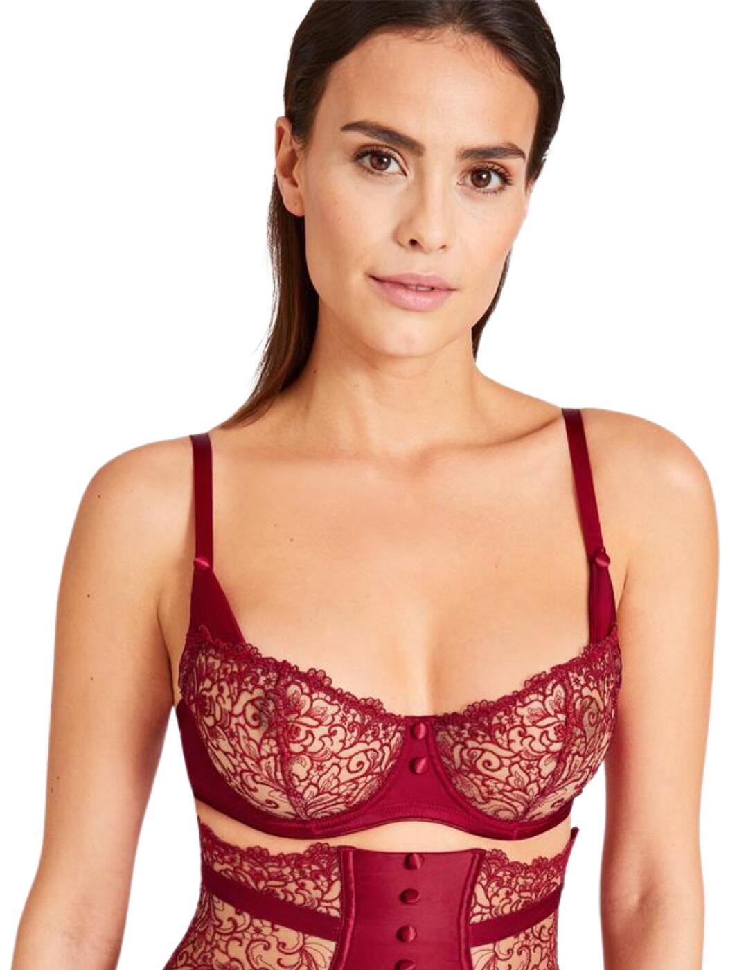 Make a statement in the chic Miss Karl collection from the Karl Lagerfeld X Aubade collaboration. This beautiful half cup bra is crafted from the finest semi-sheer tulle which seductively shows the skin through the intricate guipure style Swiss embroidery. The added satin buttons create a sexy tuxedo-inspired look echoing Karl Lagerfeld's iconic chic style. The non-padded cups create a natural shape and the flirty half-cup shape seductively highlights the cleavage. Underwiring offers added support and the adjustable straps allow for the perfect unique fit. Wear with luxurious coordinates from the Miss Karl collection.  Flirty half-cup shape Guipure style Swiss embroidery Tuxedo-inspired button details Underwired Non-padded cups Adjustable shoulder straps Hook and eye fastening Country of origin: Tunisia Composition: Cup embroidery: 83% Polyester &pipe; 17% Polyamide Composition: Lining: 100% Polyester Composition: Knit: 84% Polyester &pipe; 16% Elastane Listed in UK sizes  55856-99368-1288657 UCF14  Half Cup Bra