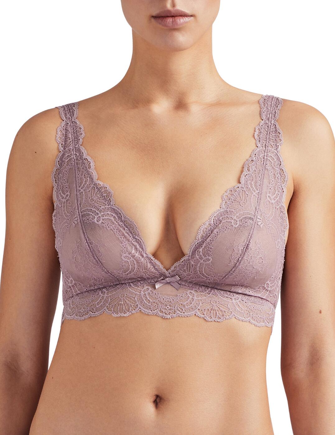 Aubade presents a luxurious yet comfortable collection for women who appreciate fine French lingerie. Danse Des Sens features refined lace with intricate floral designs for everyday enjoyment. The popular triangle bra is non wired with a plunging neckline, showcasing the cleavage. Its lightweight feel is perfect for everyday wear. Be sure to mix and match with the rest of the collection.  Luxurious triangle bra Wireless Semi-sheer lace Non-wired Adjustable straps Hook and eye closure Composition: Side lace: 88% Polyamide &pipe; 12% Elastane Lace front and back: 89% Polyamide &pipe; 11% Elastane Cup lining: 100% Polyester Listed in UK sizes  49783-89992-1192023 OG10B-6 Non-Wired Bra