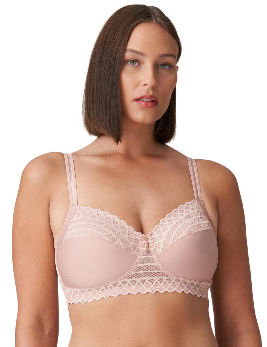 The East End collection uses seventies-inspired lace combined with modern designs for a timeless retro style. This soft cup bra flaunts premium symmetrical lace which adorns the underband and cups for a statement feminine look. A scalloped lace edge and central pendant charm add a luxurious finish to the full cup design. The lace longline underband and striped straps add a glamorous athleisure look to this classic bra. A wireless and non-padded design offers the utmost comfort that is perfect for everyday wear. Complete the perfect coordinated look with matching lingerie available from the East End range by Prima Donna.