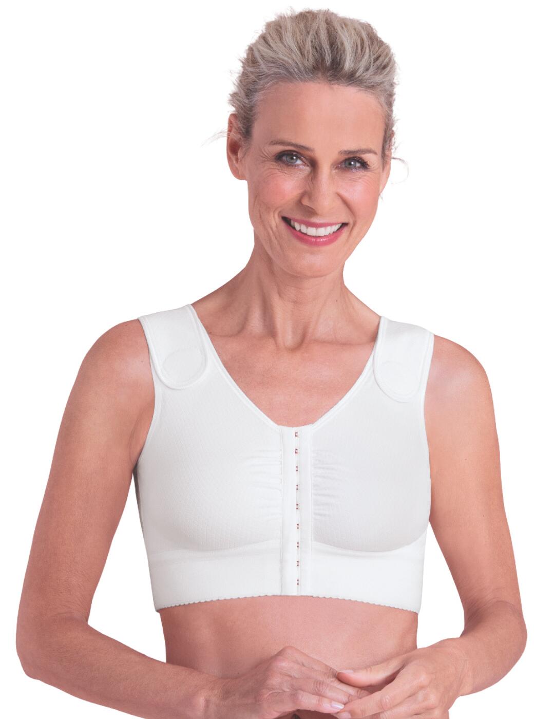The Munich collection by Anita focuses on providing the utmost high-quality post-surgery bra's that encourage the healing process. This compression bra has a bandage design and supports the healing process by applying controlled compression to scar tissue and relieves the lymphatic drainage pathways. The innovative bra is designed especially for following plastic breast surgery, including breast reduction, breast lift, breast reconstruction using the patient’s own tissue. Velcro straps and an adjustable hook and eye front closure for flexible adjustments during the healing process. Can be worn with a coordinating Anita post-surgery belt for extra security.  Specially designed for post-surgery Wide stretch underband High cut neckline Velcro shoulder straps Adjustable hook and eye front fastening Coordinating post-surgery belt available Country of origin: Myanmar Composition: 66% Nylon &pipe; 29% Elastane &pipe; 5%Polyester Listed in UK sizes  52362-94202-1233764 1164 Compression Bra