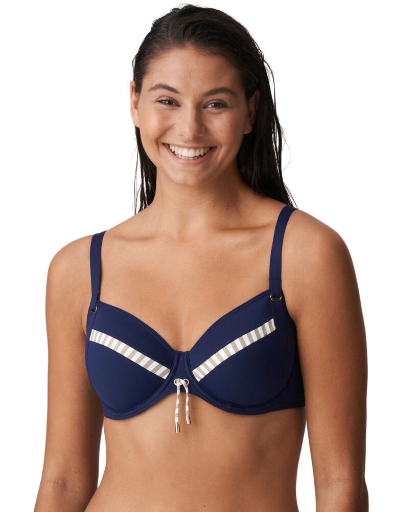 Are you looking for that perfect bikini top to take with you to the pool or beach? This Full Cup Bikini Top is the one for you. Prima Donna Swim has crafted this gorgeous top for the Ocean Mood range. The elegant lines along the cups create a feminine touch. Adjustable straps ensure a perfect fit for the multiway design. The underwiring in the cups offer extra support making this the perfect swimwear item. The three-piece cut and double cups lift and centre the breasts creating an irresistible cleavage and a naturally rounded shape. Match with coordinating items to complete the look.  Adjustable multiway straps Underwired Three-piece cut Double cups Elegant and feminine Composition: 71% Polyamide &pipe; 22% Elastane &pipe; 6% Polyester &pipe; 1% Metal fibre  Listed in UK sizes  49968-90407-1195066 4008310 Full Cup Bikini Top