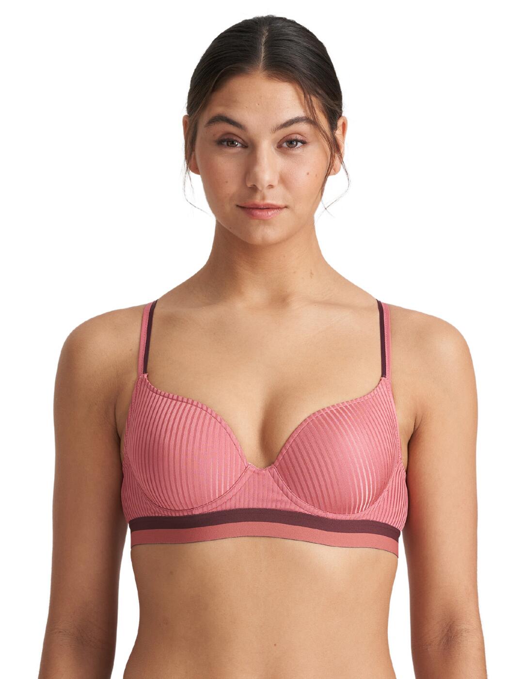 This heart-shaped padded bra from Marie Jo is sure to become your new firm favourite with its cute and girly design and incredible fit. From the Jude collection, this bra features the all-over ribbed fabric with the 2 coloured block stripe that sits at the under band and straps which adds a fun sporty vibe. Their heart-shaped cups are one of their best styles as they are super flattering to your cleavage along with the padded cups and slight plunging neckline that creates an irresistible cleavage. It ensures a comfortable fit with adjustable straps, underwire and a hook and eye closure.  Heart-shaped padded bra All over ribbed fabric with 2 coloured block stripe detail Cute and girly with a sporty vibe Flattering shaped cups create an irresistible cleavage Underwired for supportive Adjustable straps and a hook and eye closure for a comfortable fit Country of origin: China/Nanhai Composition: 57% Polyamide &pipe; 37% Polyester &pipe; 6% Elastane Listed in UK sizes  56155-99728-1295129 0122256  Padded Bra