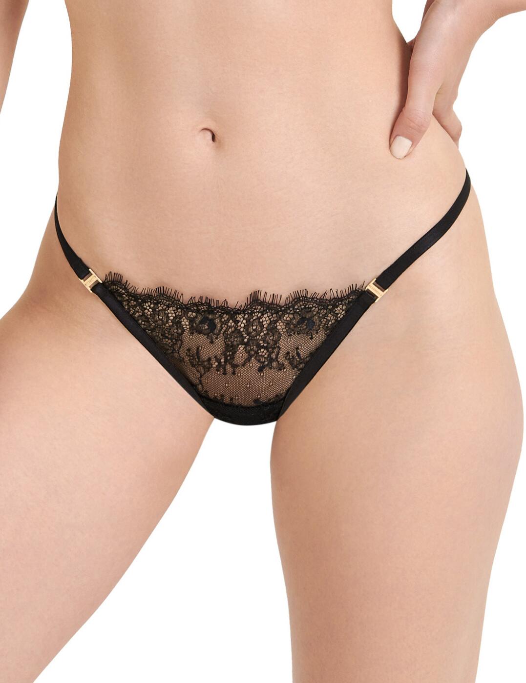 Feel gorgeous with the Grace range by Bluebella. Satisfy your desires in the revealing and flirty thong featuring a lace front panel which is lined with dainty eyelash trims for a feminine finish. The minimal rear coverage gives a cheeky shape to this piece and, along with the elasticated straps, aims to leave no VPL. Create an immaculate set by styling it with other glamourous items also found in the Grace collection.  Lacy thong Eyelash trims Elasticated straps Minimal rear coverage Gold-tone hardware Matching coordinates available Country of origin: China Composition: Main: 69% Polyamide &pipe; 18% Polyester, 13% Elastane Composition: Gusset: 100%viscose from bamboo Listed in UK size  59781-104555 41704 Thong