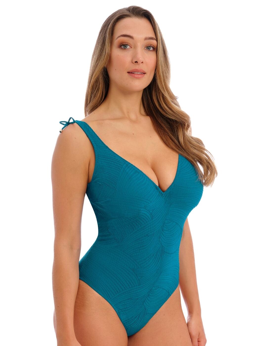 Discover flattering swimwear with the Fantasie Ottawa plunge swimsuit! This elegant and tasteful design offers a comfortable and supportive fit anyone will appreciate. Featuring a deep v-neckline and non-padded cups with concealed underwiring, this plus size option is as fashion-forward as it is comfortable. The unique pull-on design features adjustable width straps at the shoulder that allow you to customise your fit precisely. The low scooping back paired with a high leg cut gives this piece an on-trend look and contemporary silhouette. With moderate rear coverage, you ll feel supported and secure in Fantasie s Ottawa plunge swimsuit! Get ready for fun in the sun with the stylish Ottawa plunge swimsuit!